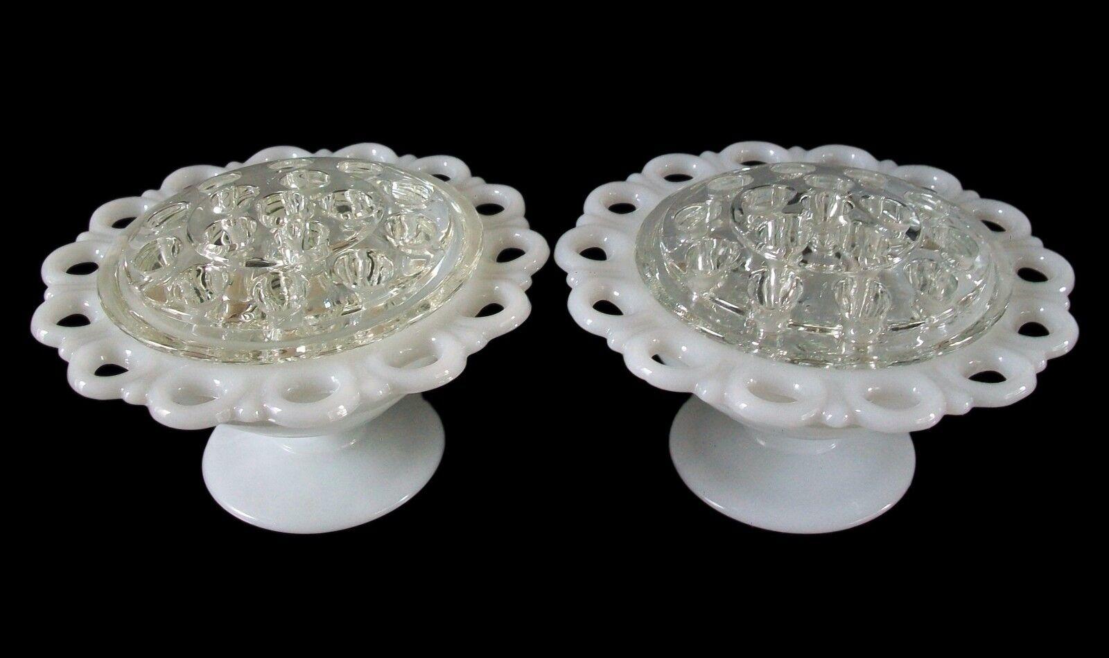 Vintage rare pair of open lace milk glass rose/flower bowls with their original clear glass flower frogs - pressed opaque glass - unsigned - United States - mid 20th century.

Excellent/mint vintage condition - no loss - no damage - no restoration