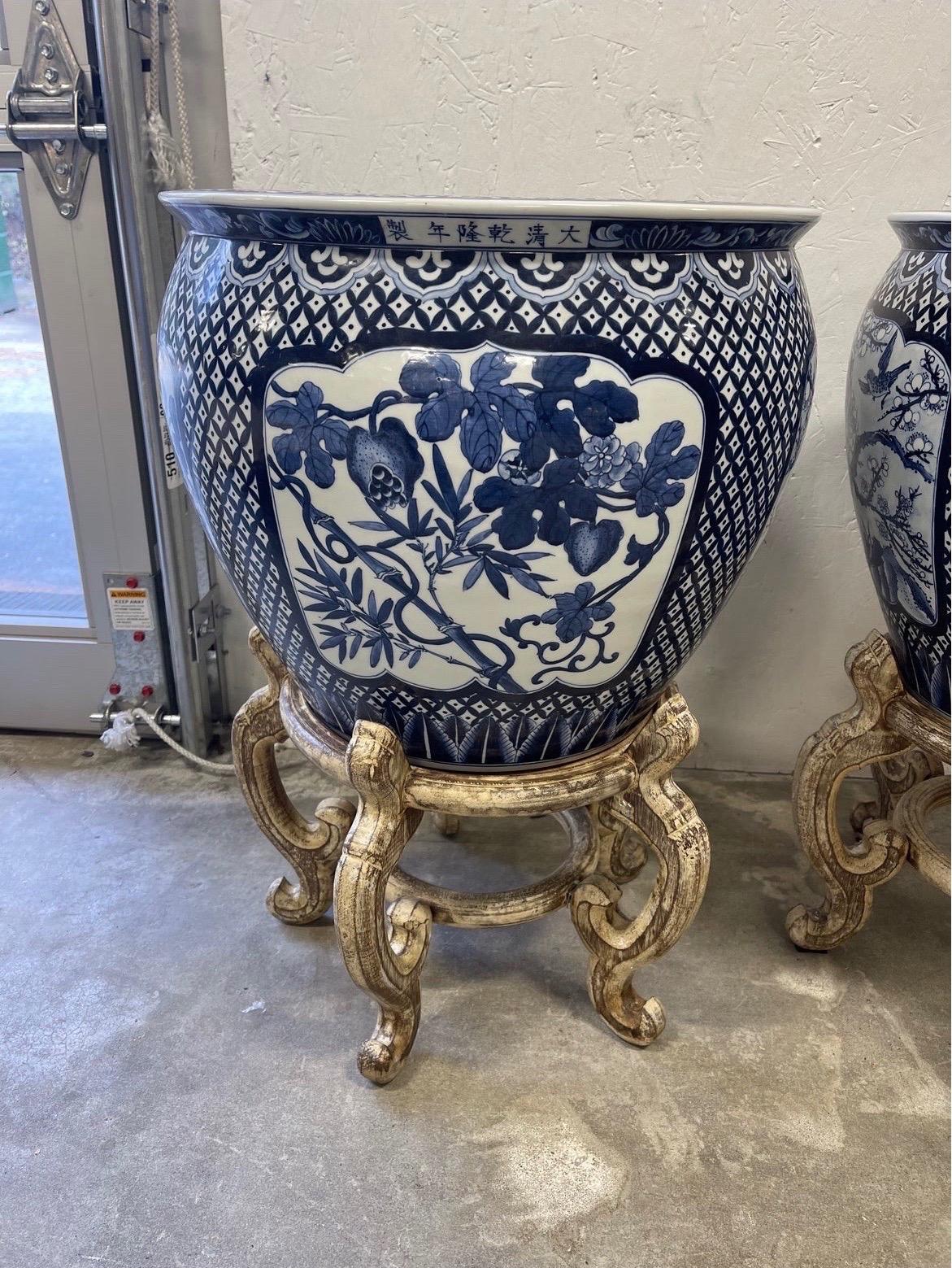 Porcelain Pair, Opposing Chinese Export Style Blue and White Jardinieres on Stands