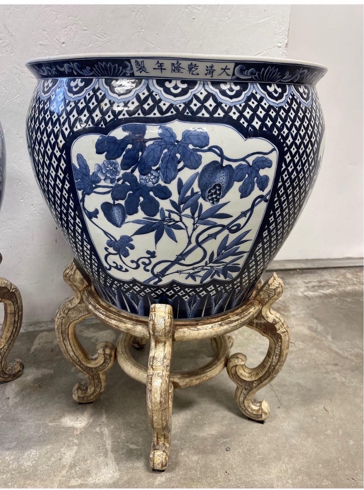 Pair, Opposing Chinese Export Style Blue and White Jardinieres on Stands 1