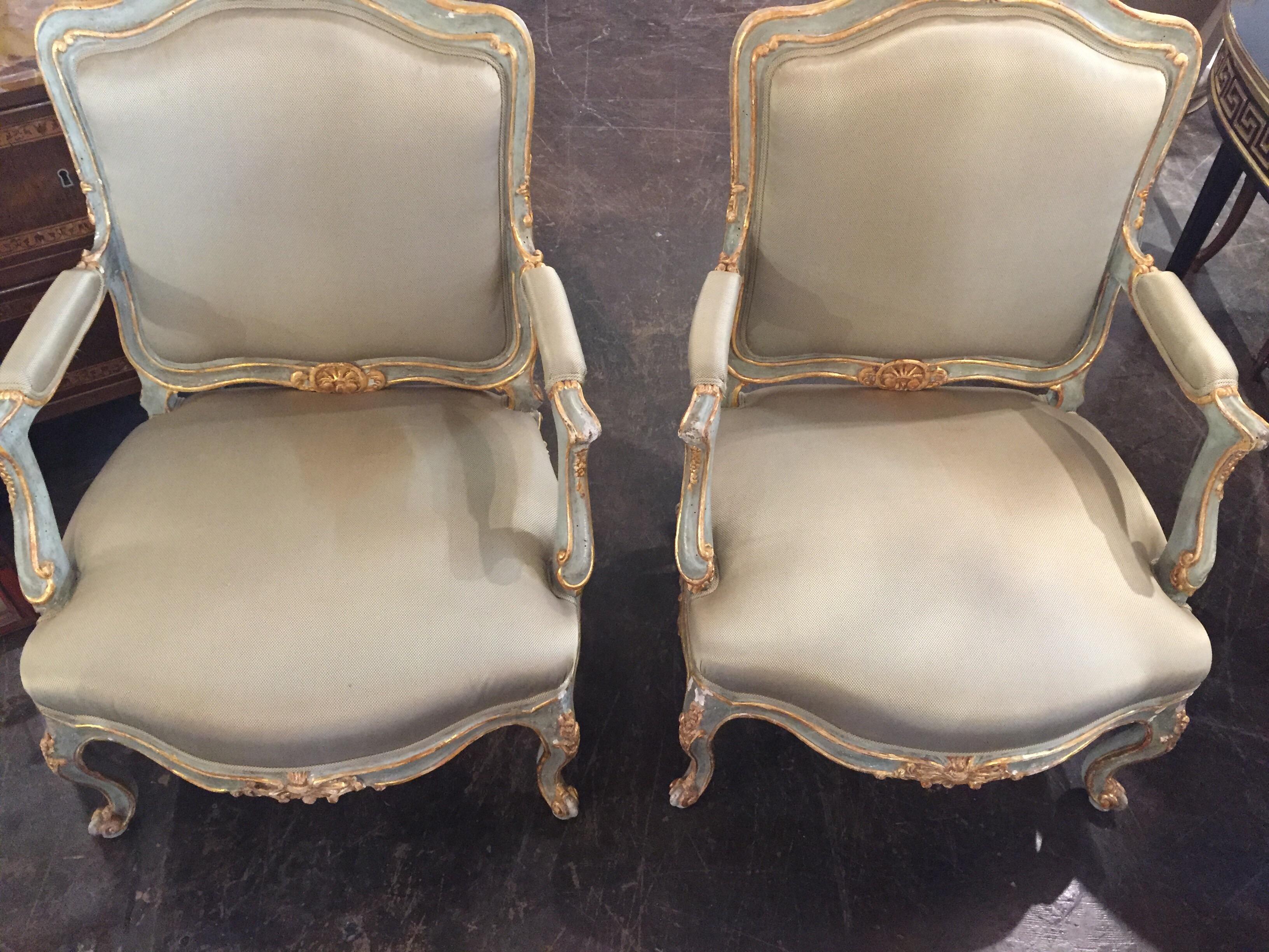 Pair of 18th century Louis XV style armchairs, circa 1780. Beautiful original partial gilt finish and recently upholstered in sage green silk. A Classic example of Fine 18th century French furniture. Ready to make a statement in a fine home.