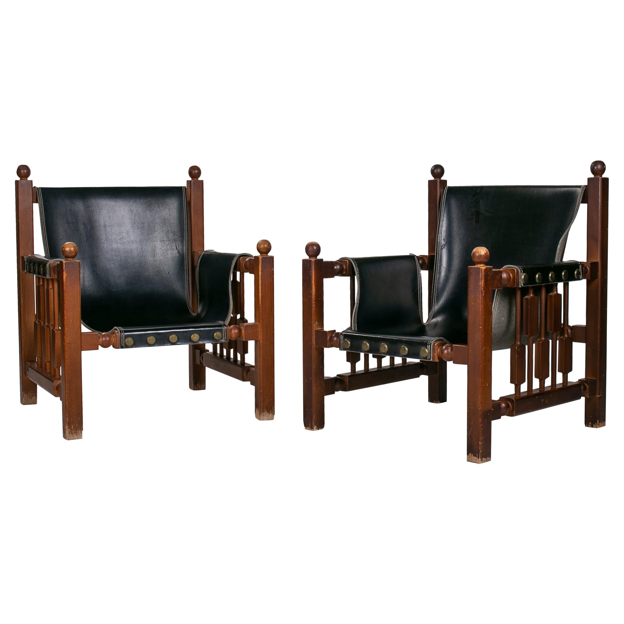 Pair or 1960s Paco Muñoz Designer Wood and Leather Armchairs For Sale