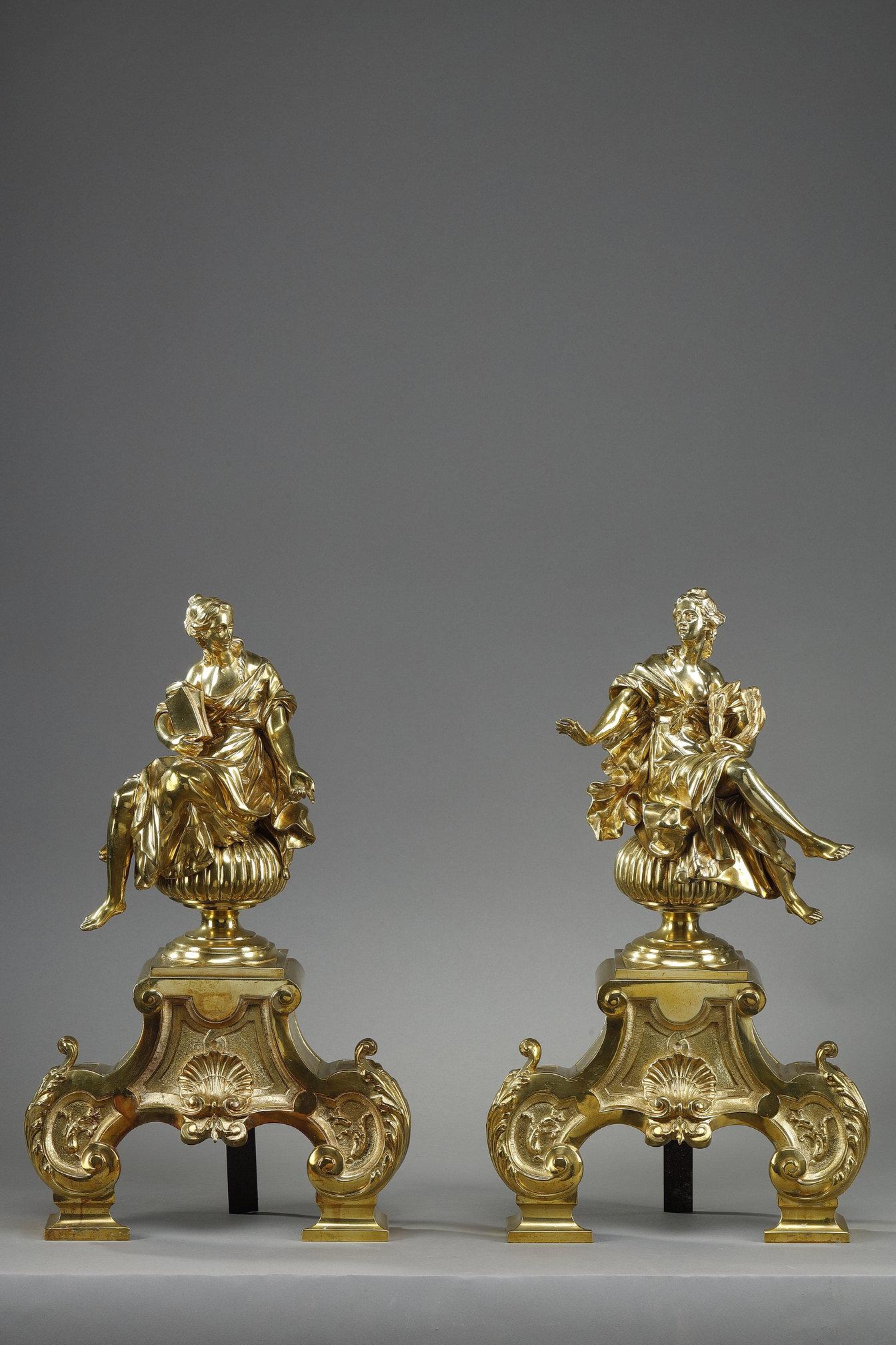 Pair of Louis XIV style ormolu and chased mantel lights decorated with muses seated on gadrooned balls, the base scrolled and foliated. The muses are draped and appear to be conversing opposite each other. One is carrying a book, the other a laurel
