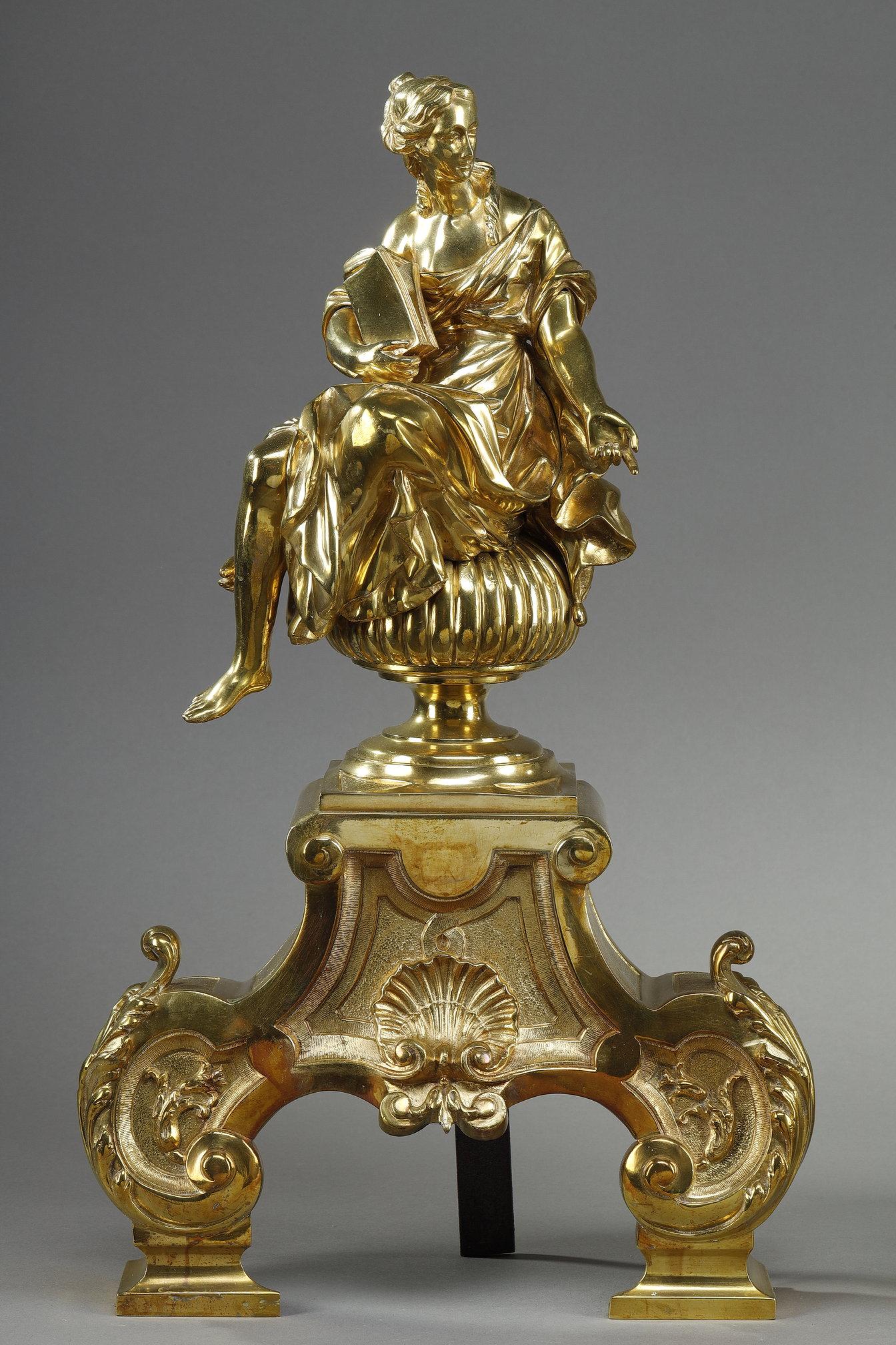 French Pair or Louis XIV style andirons decorated with seated Muses For Sale