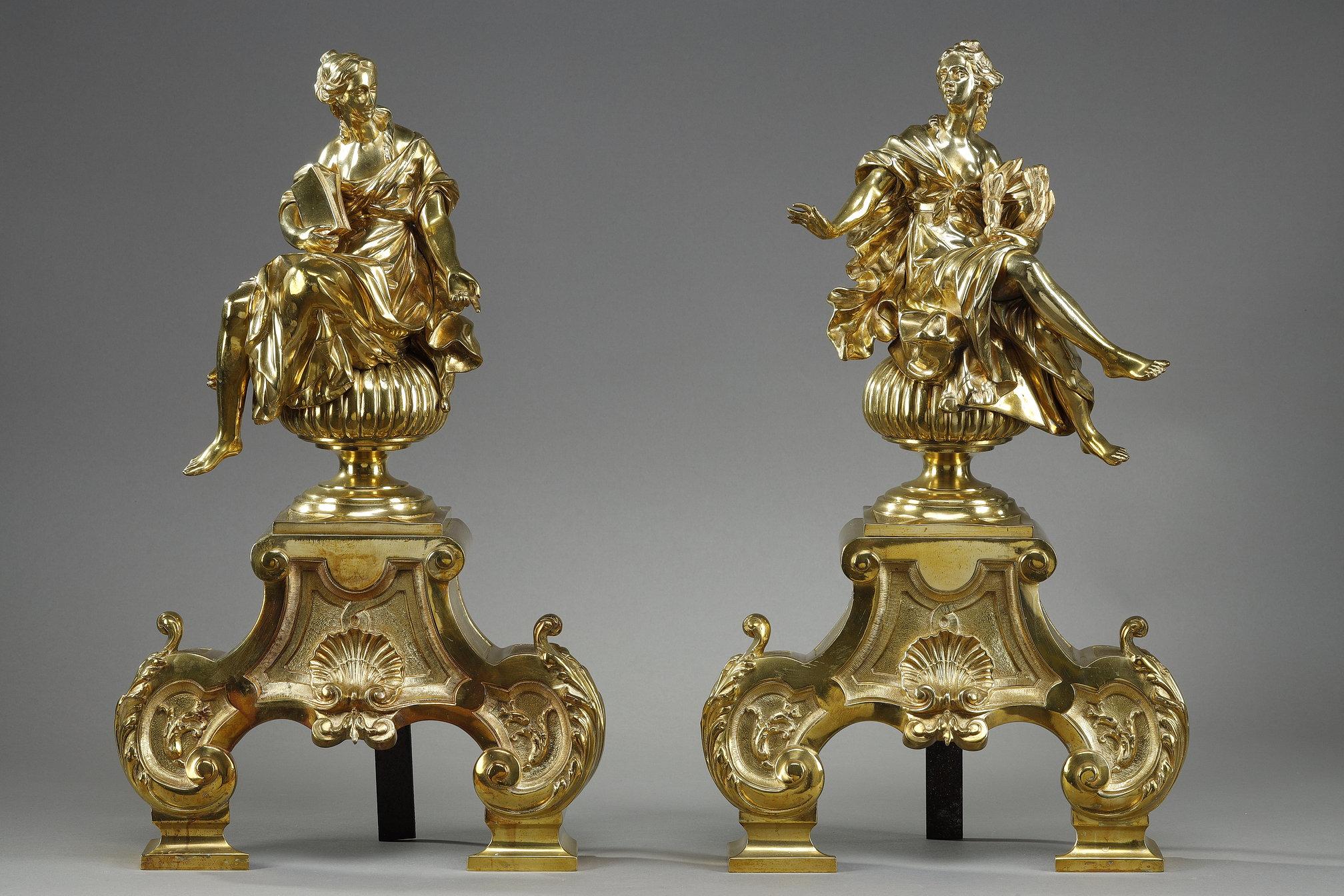 Early 20th Century Pair or Louis XIV style andirons decorated with seated Muses  For Sale