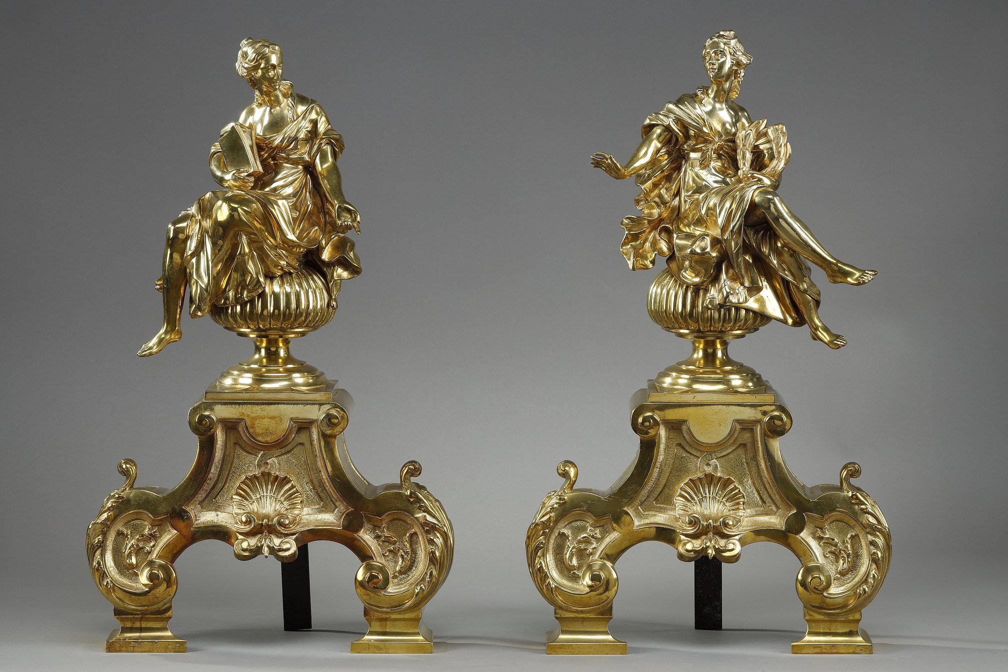 Early 20th Century Pair or Louis XIV style andirons decorated with seated Muses For Sale