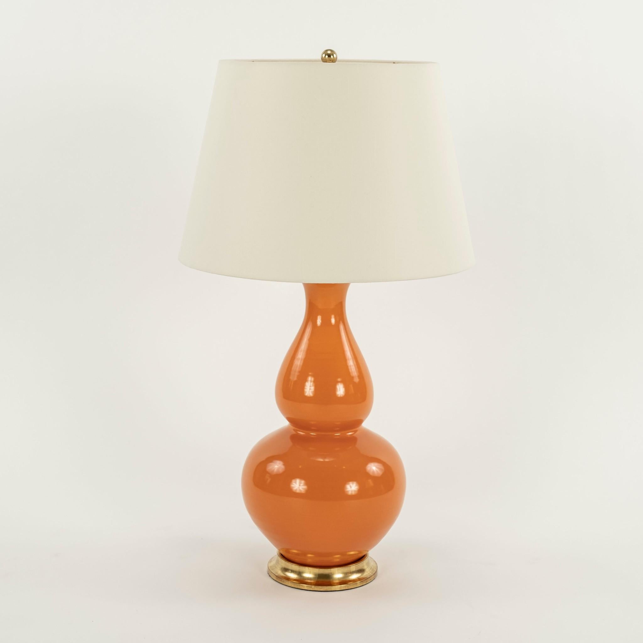 Pair of Christopher Spitzmiller table lamps: Aurora ceramic double gourd with 23K water gilt base, brass cap and silk shades