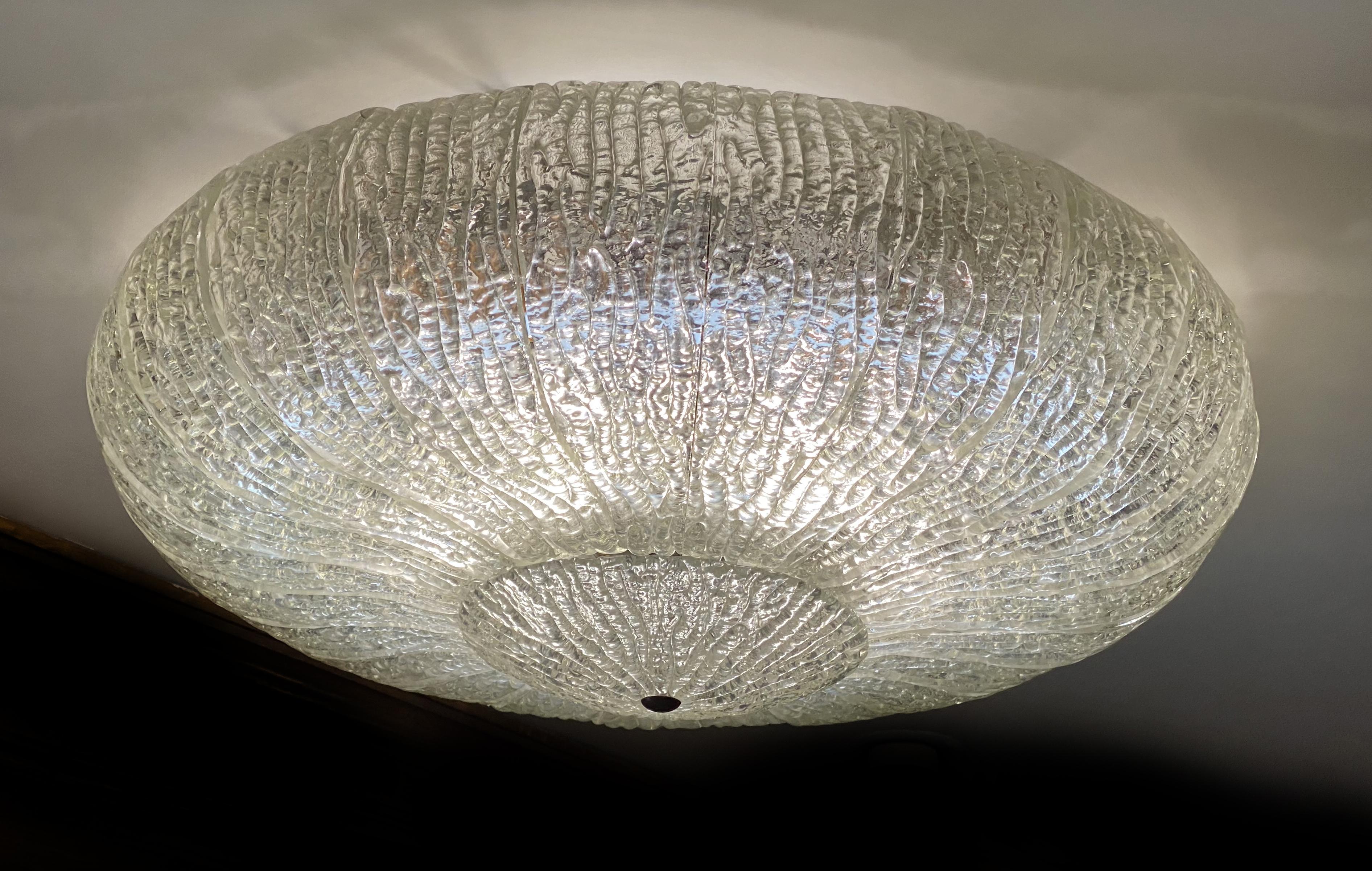 Fantastic and original pair Barovier & Toso Murano Italy art glass ceiling lights. The rare lamp is made of 26 mouth-blown hand-formed leaf-form ice glass panels plus a huge glass as a bottom. The wiring is perfect, which has been replaced in recent