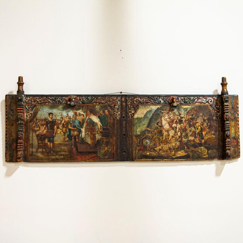 Two Sicilian donkey cart side panels, richly decorated with scenes from the opera Muzio Scevola and Coriolanus. The striking portrayals are well executed and the colors draw one in to examine in closer detail. The involved hand painted scenes with