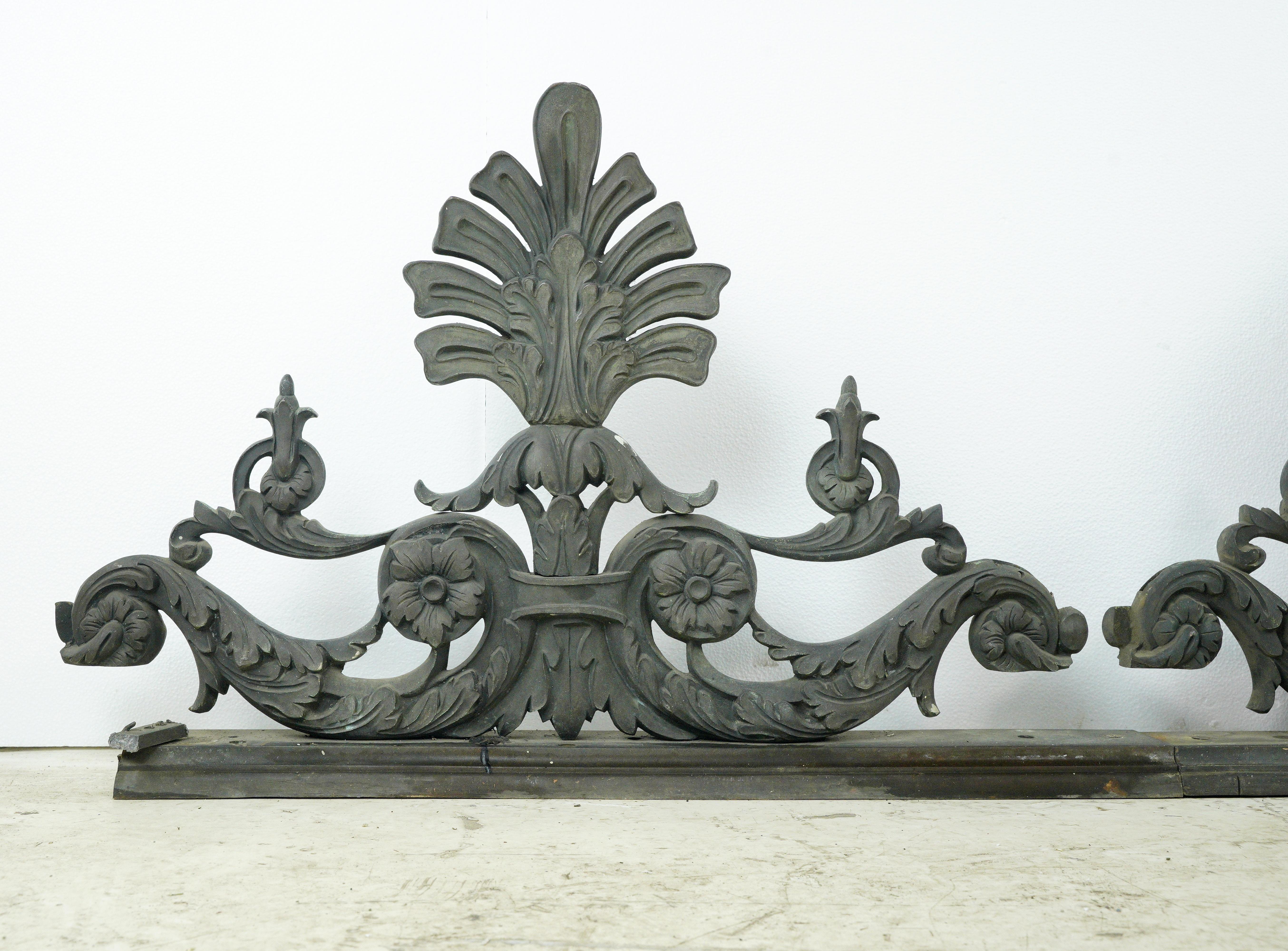 These highly ornate cast bronze architectural pediments showcase exquisite craftsmanship and artistic detailing. These treasures once decorated Blackies Restaurant in Washington DC. The green verdigris patina adds a touch of timeless elegance,