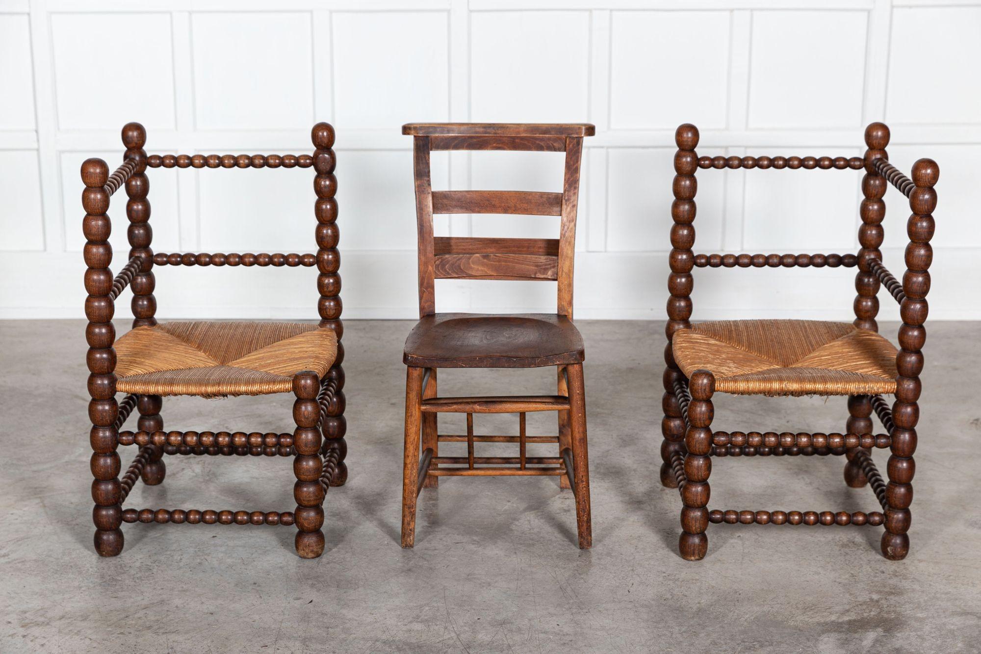 circa 1870
Pair oversized 19th C French oak Bobbin chairs.
Oversized thick bobbin frames with restored rush seats.
Exceptional scale and form.
sku 1321
Measures: W47 x D48 x H84 cm.