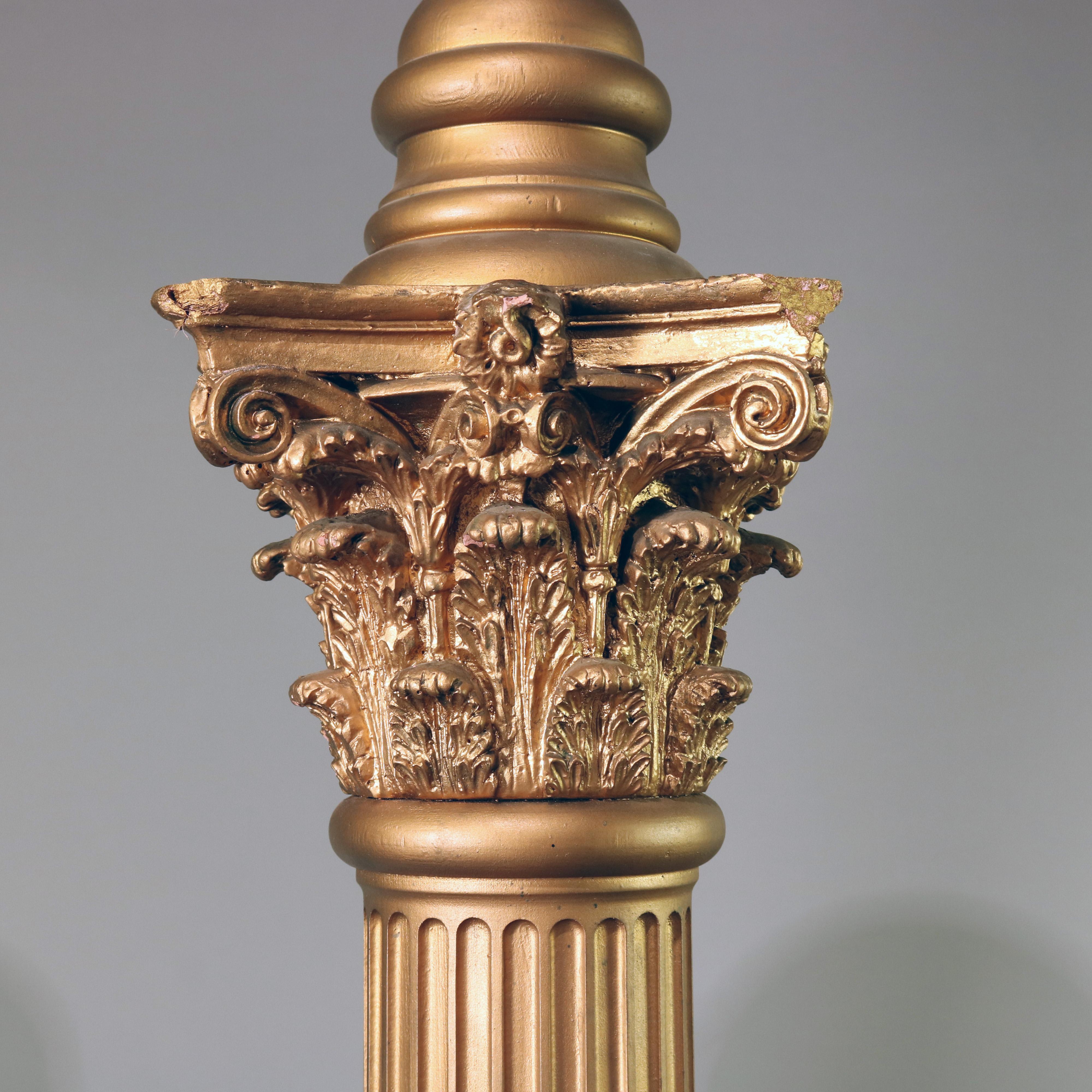 Pair of vintage oversized Masonic Lodge or Knights Templar ceremonial gilt composite Corinthian columns having foliate and scroll capitals and stepped bases with each surmounted by a world globe, 20th century

***DELIVERY NOTICE – Due to COVID-19 we