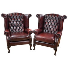 Pair of Ox Blood Red Leather Button Back Armchairs