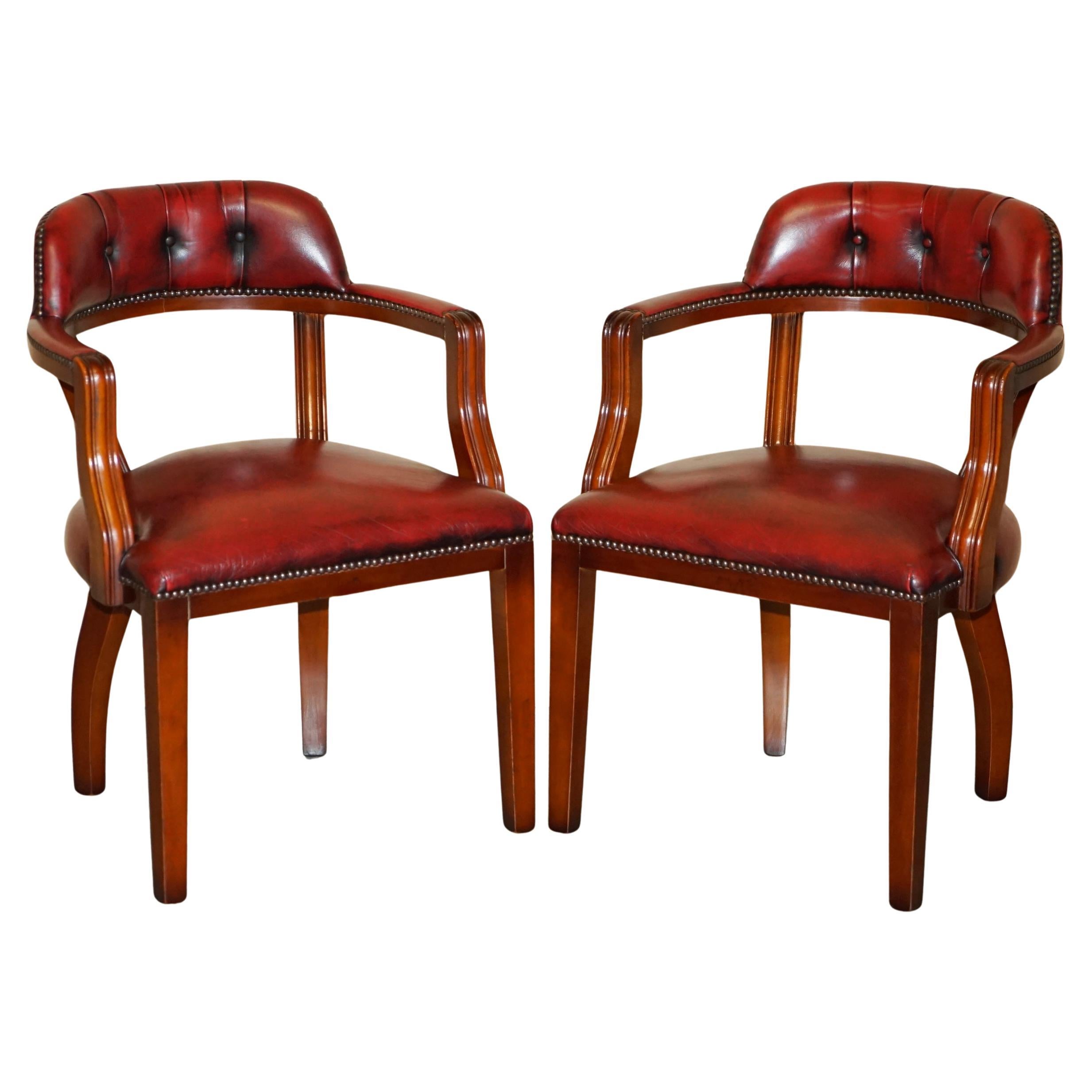 PAIR OXBLOOD BORDEAUX LEATHER CHESTERFiELD COURT CAPTAINS CHAIRS PART OF SUITE