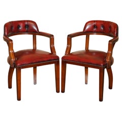 PAIR OXBLOOD BORDEAUX LEATHER CHESTERFiELD COURT CAPTAINS CHAIRS PART OF SUITE