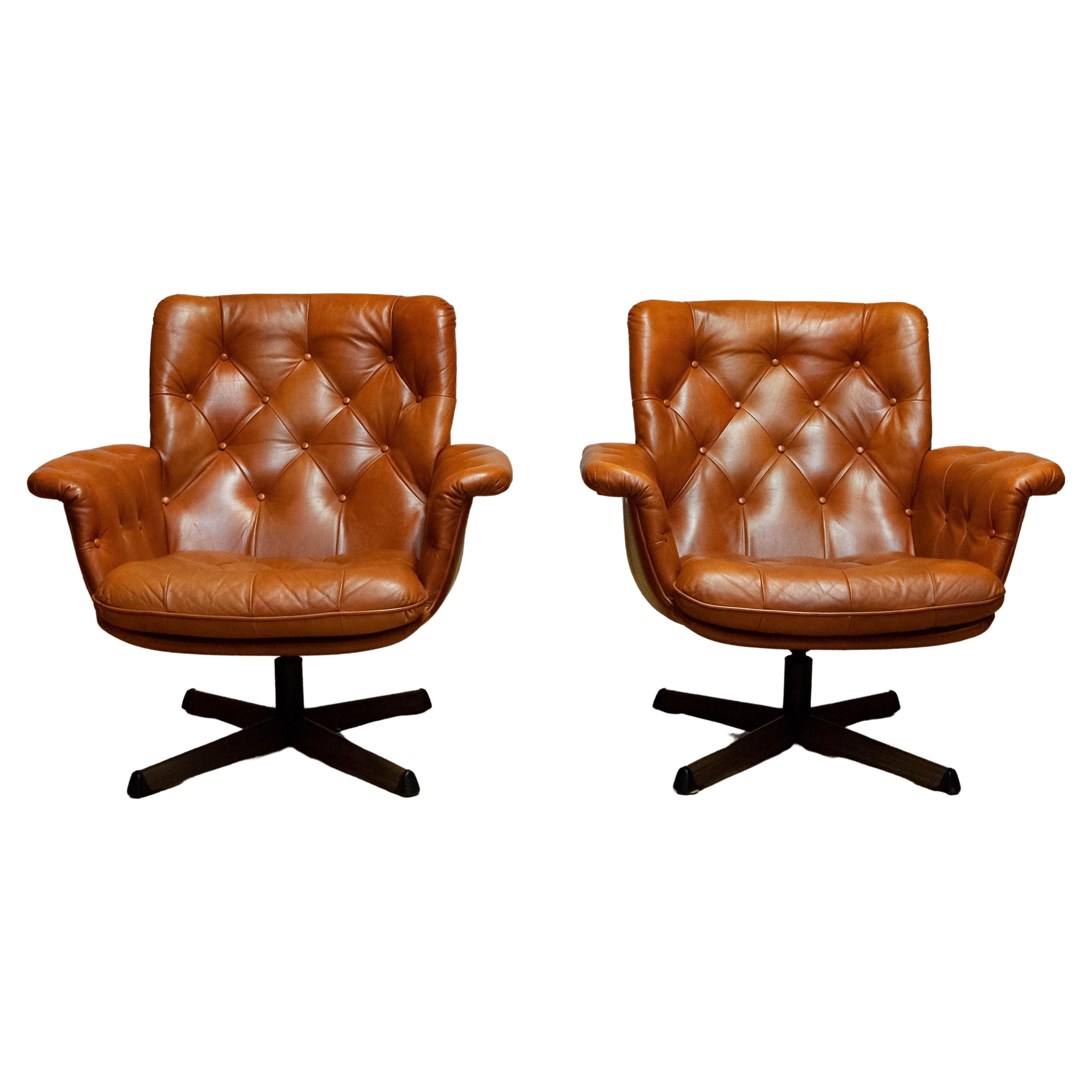 Pair Padded EVA Swivel Chairs In Tan Brown Leather By Göte Nassjö Sweden