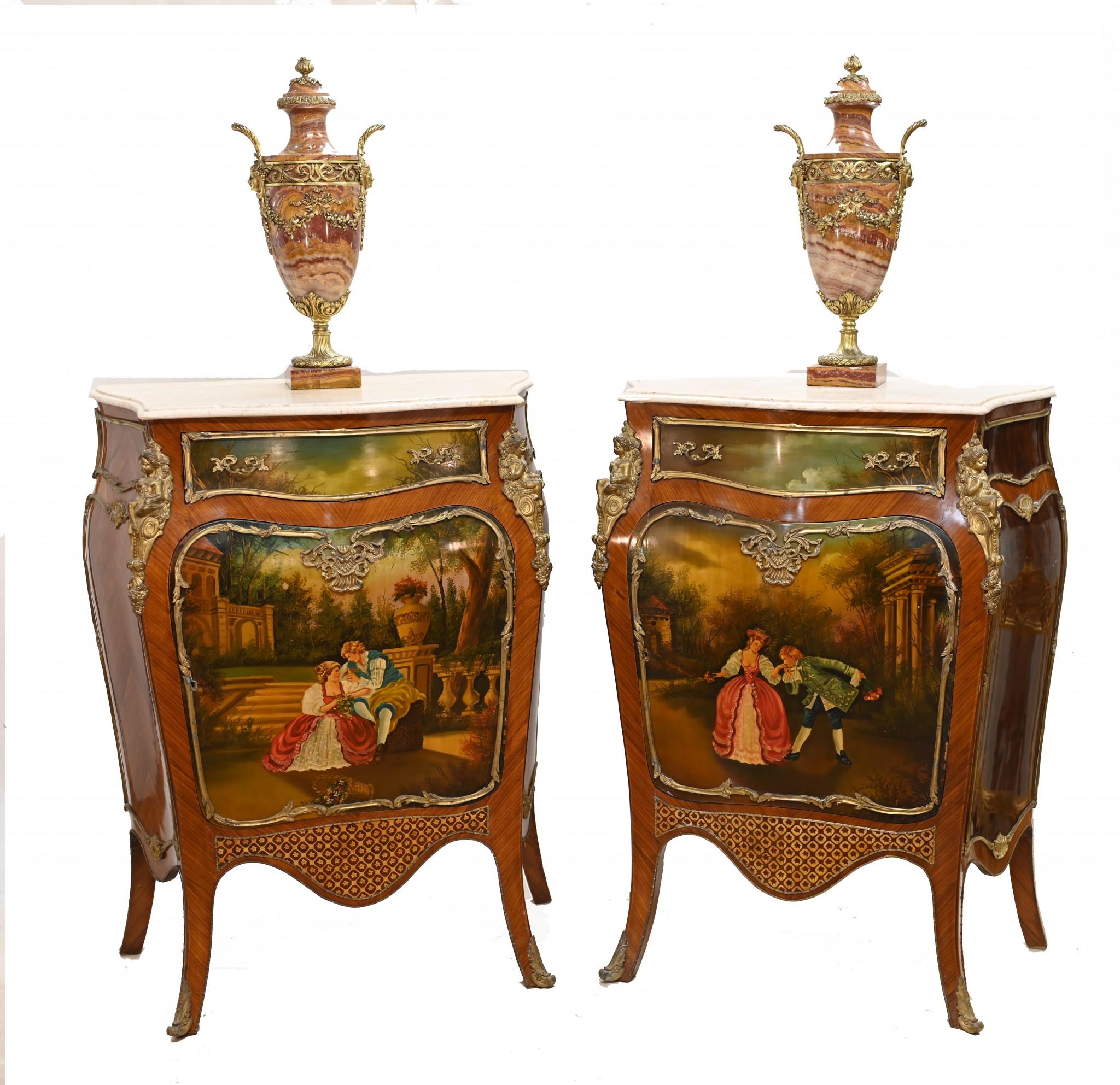 Gorgeous pair of French painted cabinets in the Vernis Martin style
Elegant pair with original ormolu fixtures
Painted sections are in the lacquered Vernis Martin style
White marble tops are smooth and chip free
Purchased from a dealer on Marche