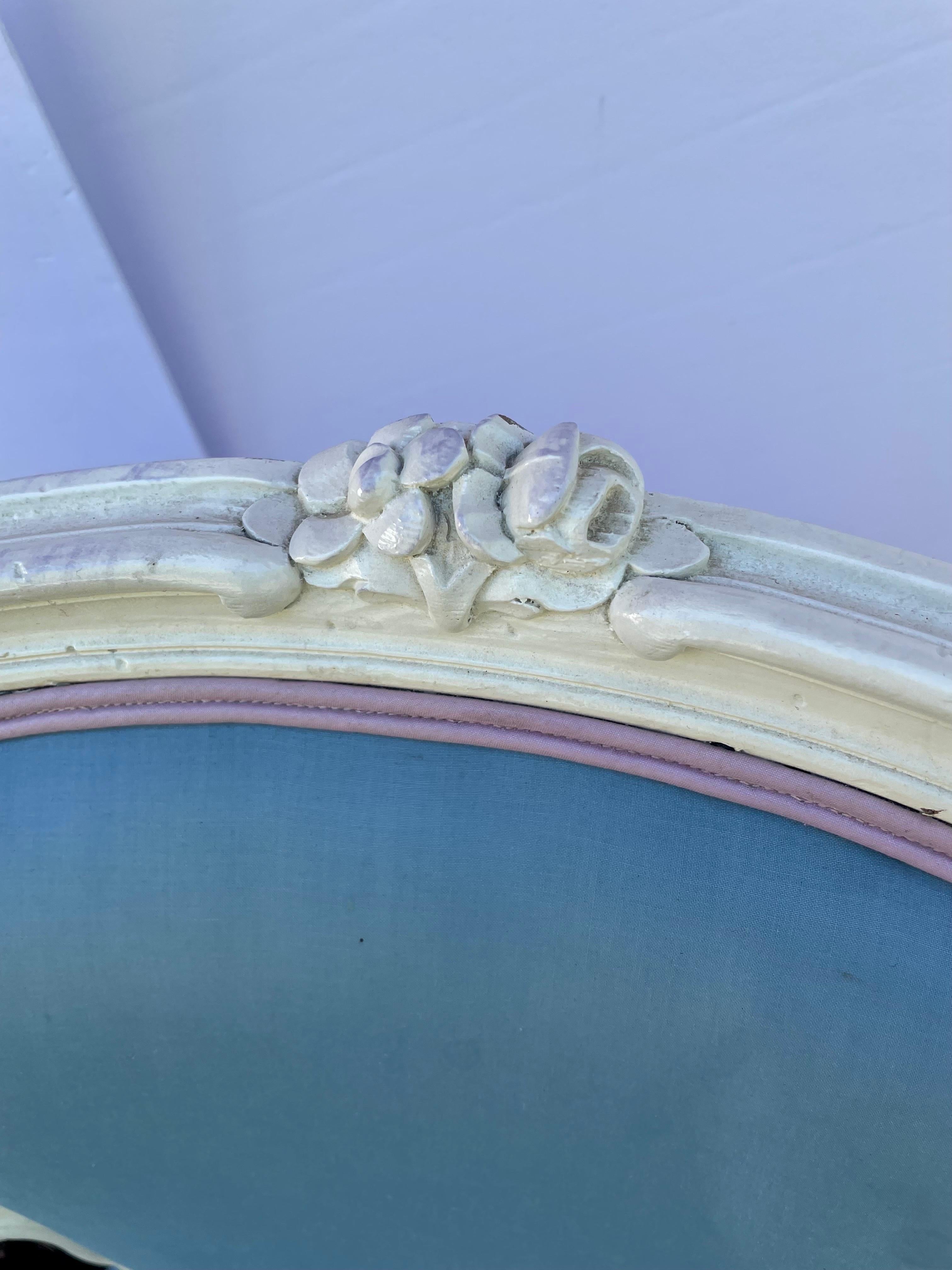 Pair Painted French Louis XV Style Carved arm chairs with white painted frames. Nice detail in the carvings. Fabric has water stains, Need to be reupholstered.