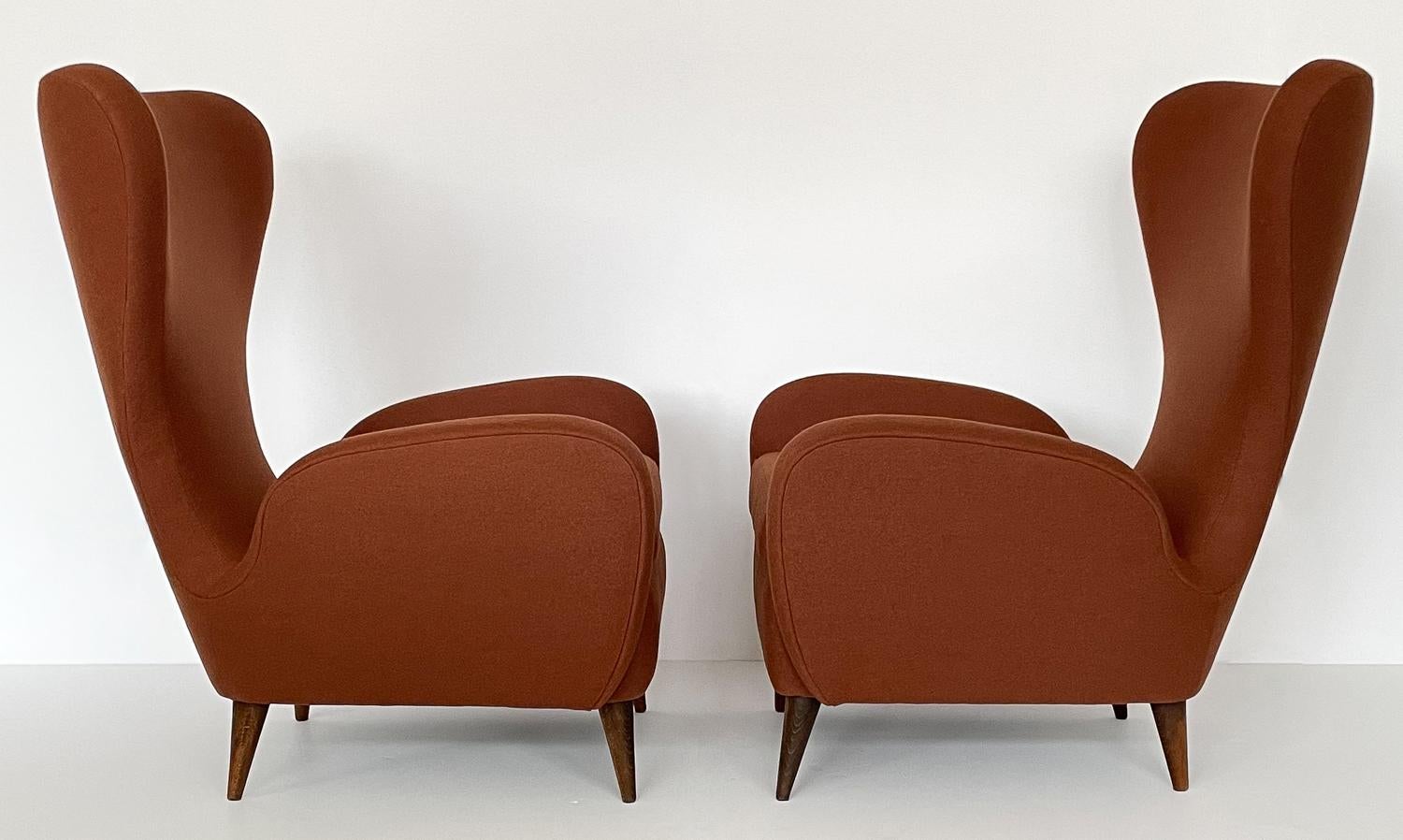 Stained Pair of Paolo Buffa Sculptural Wingback Lounge Chairs