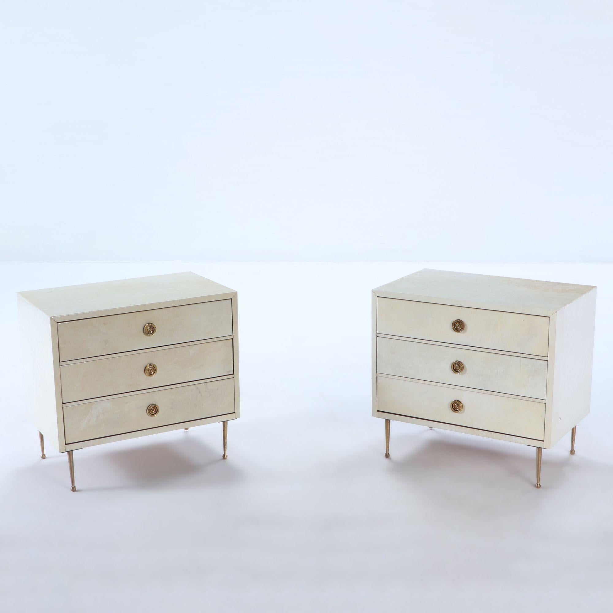 Pair parchment covered nightstands having three drawers, bronze legs and bronze drawer pulls C 1950.