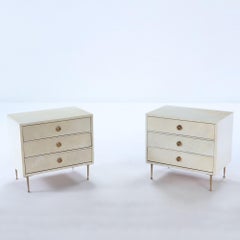 Pair parchment covered nightstands having three drawers