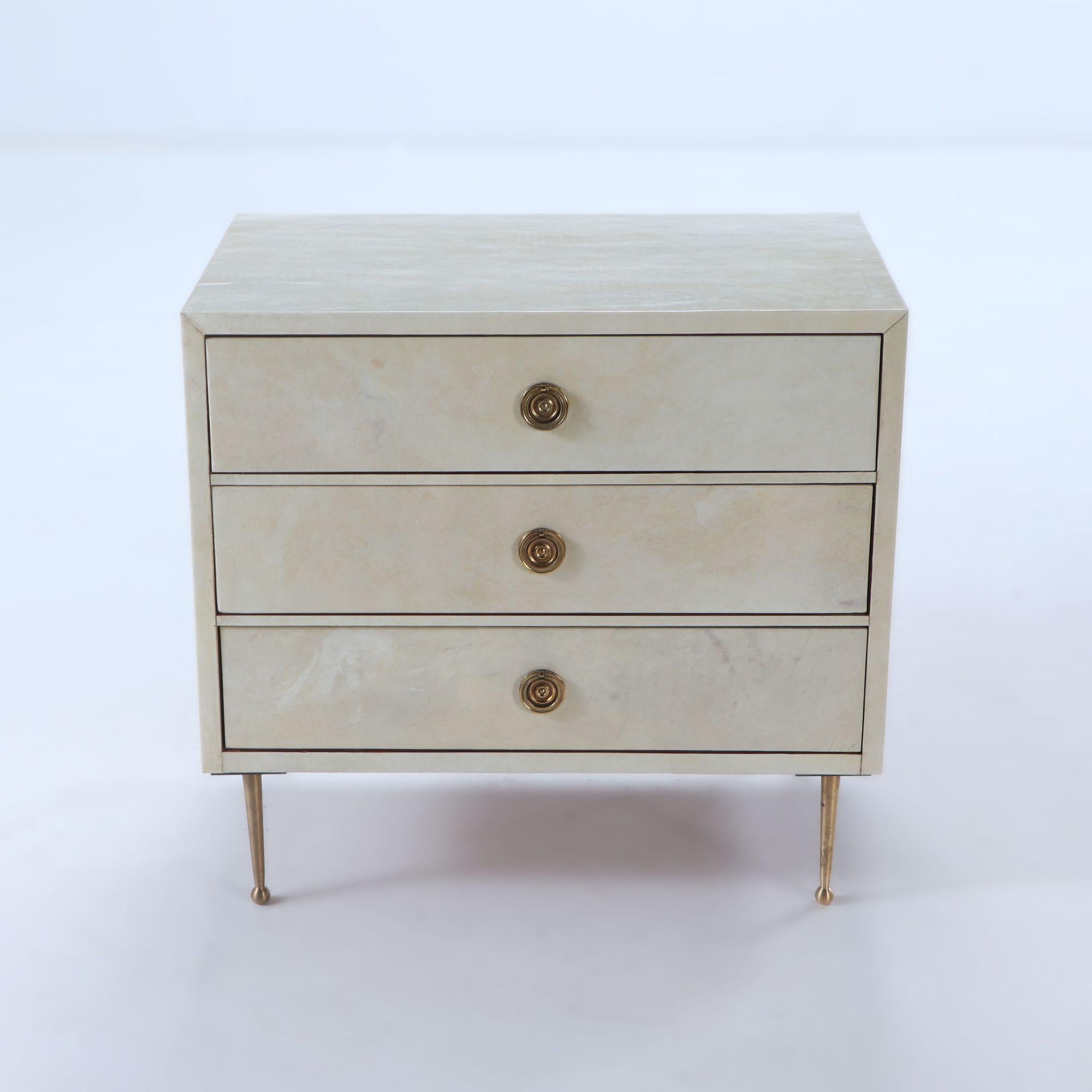 South American Pair parchment covered nightstands having three drawers For Sale