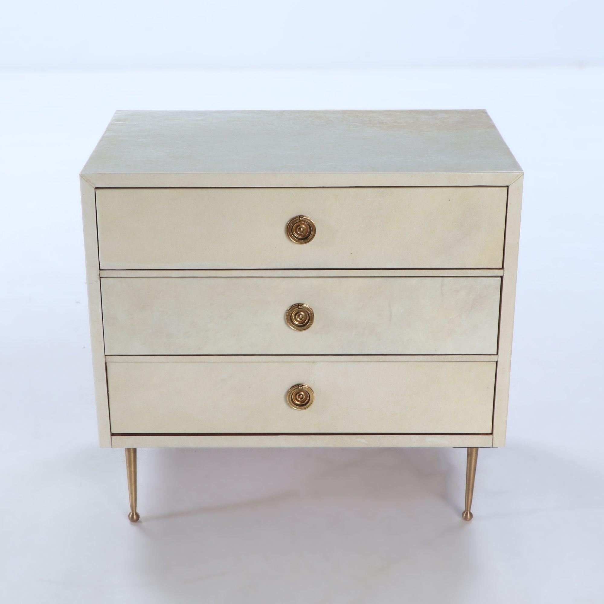 Bronze Pair parchment covered nightstands having three drawers For Sale