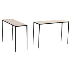 Pair parchment & iron console tables in the manner of Jean-Michel Frank.