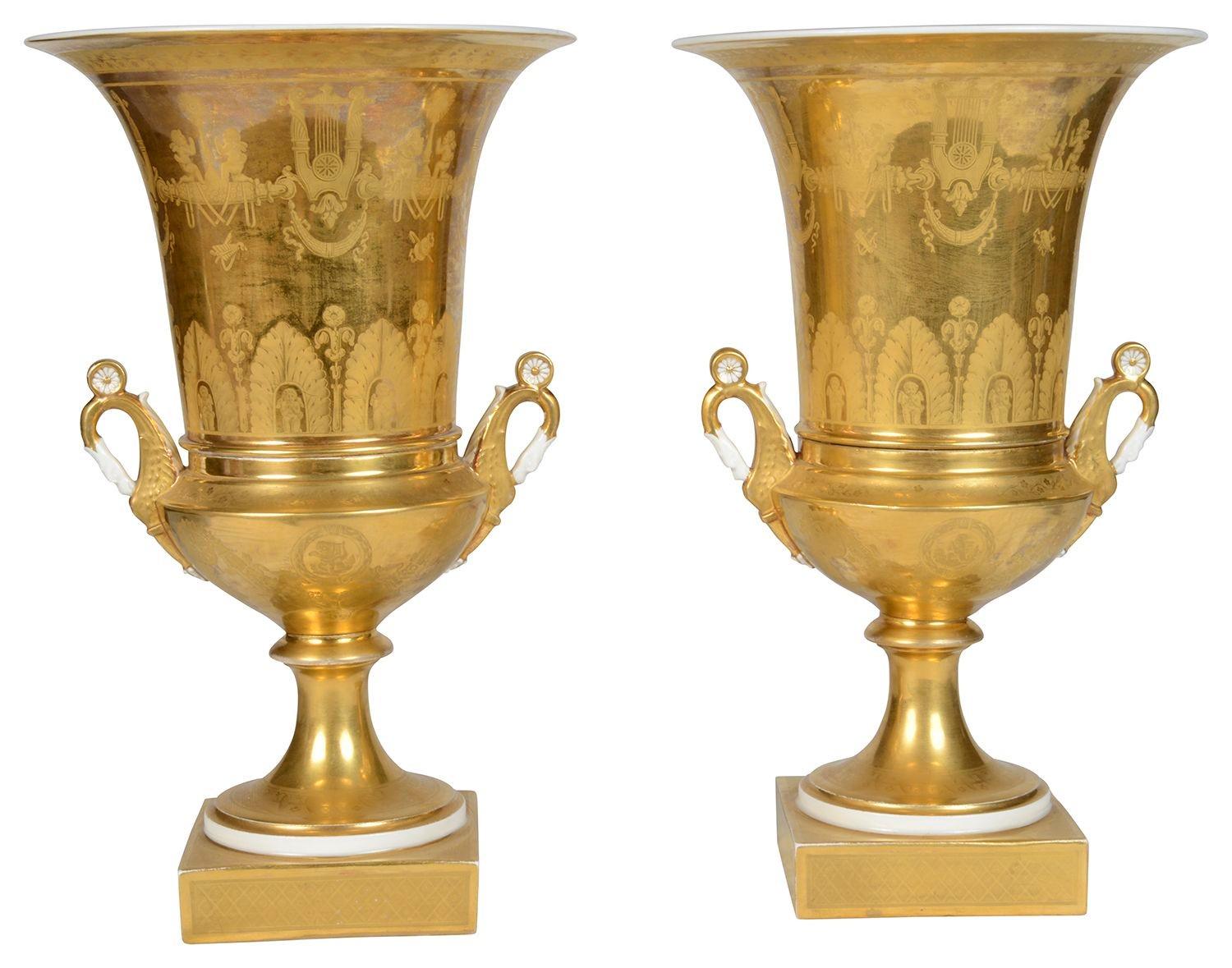 Porcelain Pair Paris porcelain gilded urns, circa 1880 For Sale