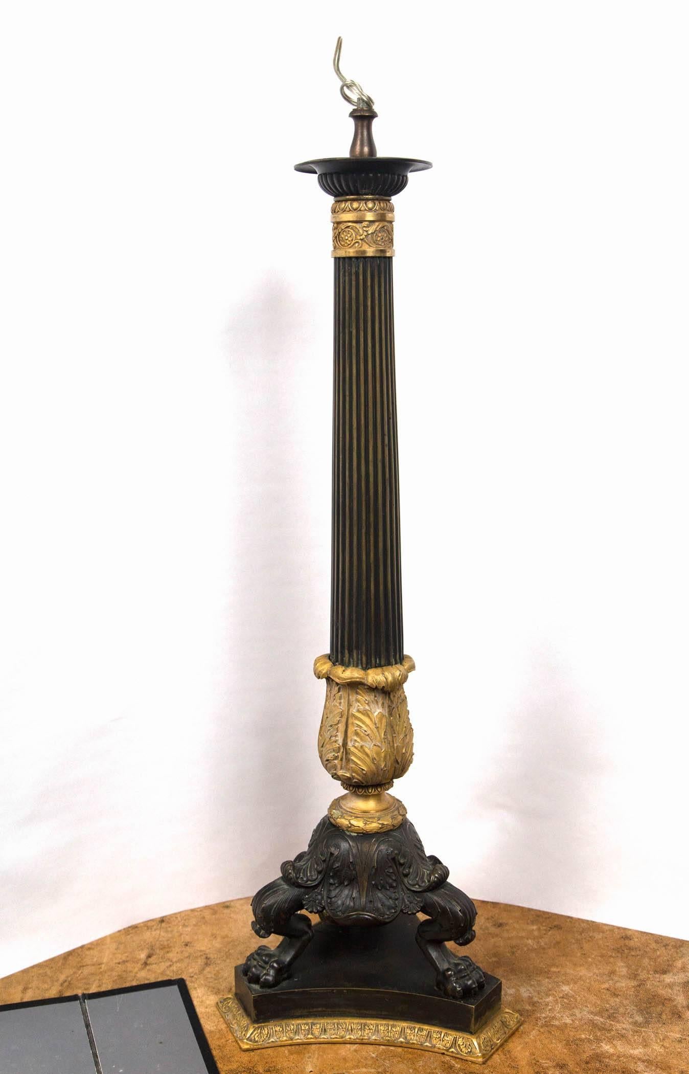 Fluted central shaft, topped by a fire gilt collar. The bottom of gilt acanthus leaf. Raised on fanciful scrolling legs with paw feet, on a tripartite base supported with a similar shaped gilt bronze bottom rim.