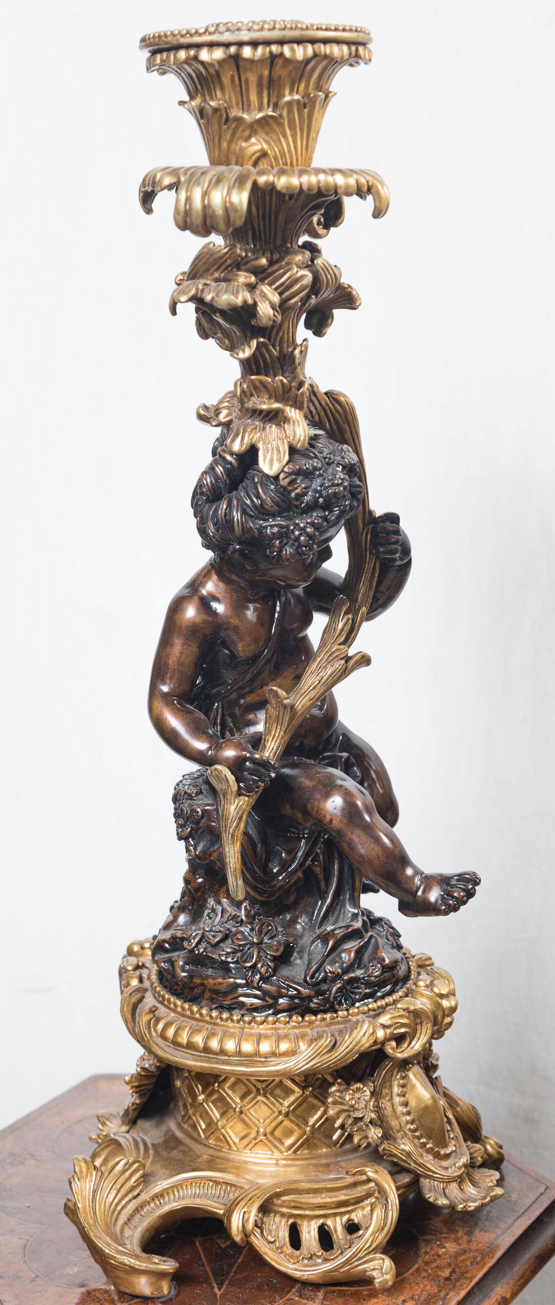 Rococo Pair Patinated and Gilt Bronze Putti Candlesticks For Sale