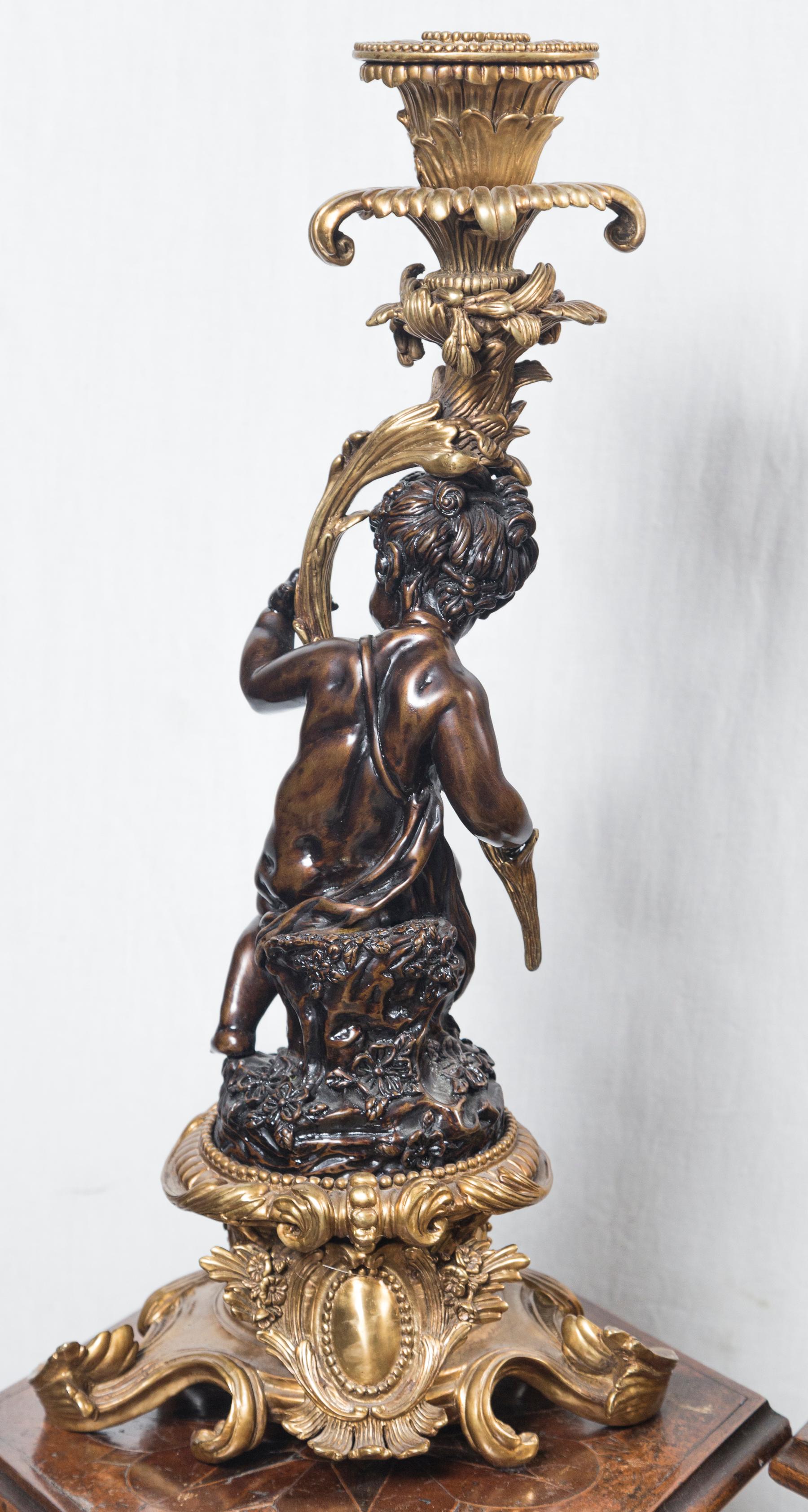 Pair Patinated and Gilt Bronze Putti Candlesticks For Sale 1