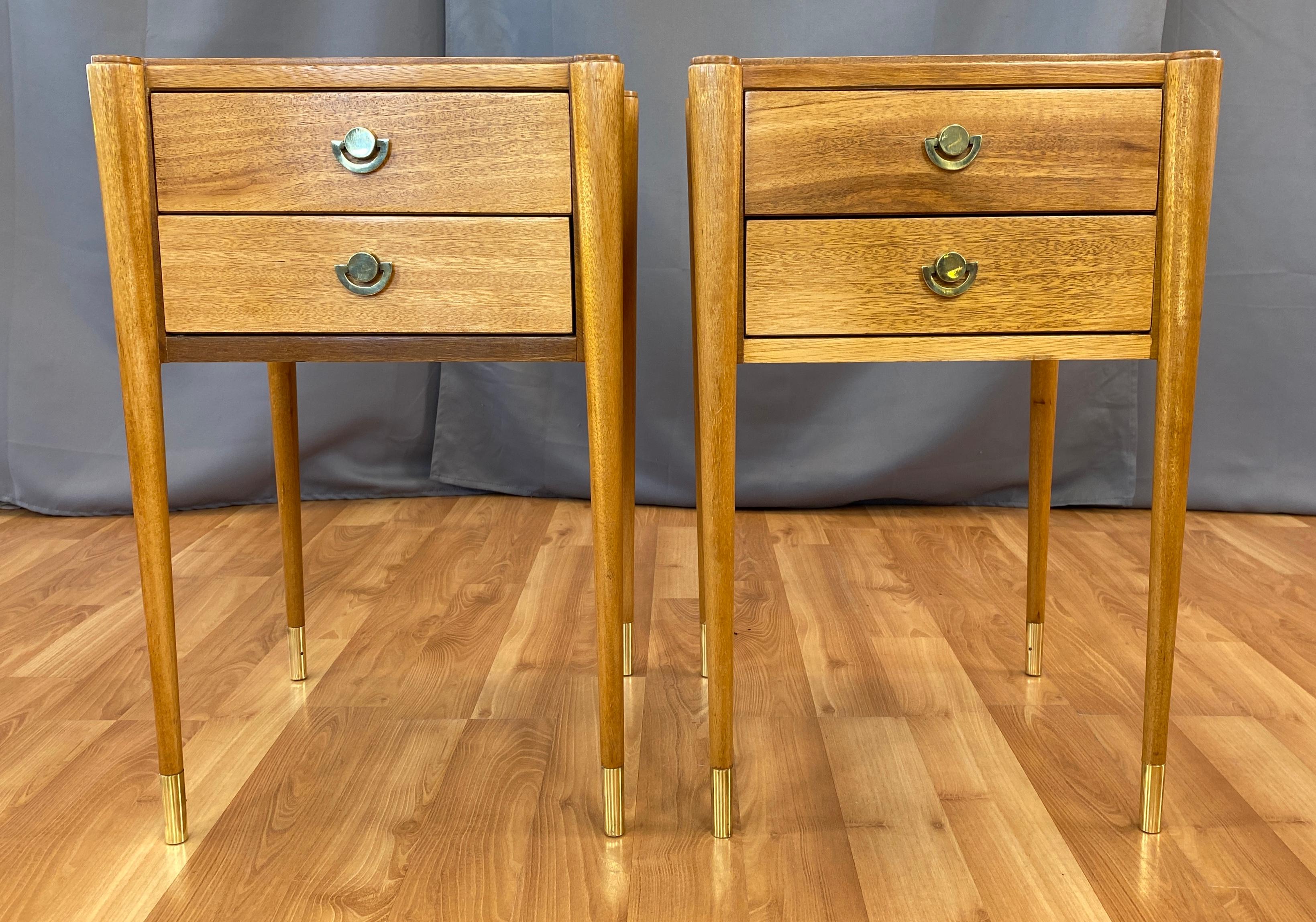 Offered here are a pair of stunning, slim leggy Blonde Mahogany end tables. 
A Paul Frankl design for Brown Saltman, marked on the underside. 
Classic California Mid-Century Modern, circa 1950s.

Each table with the four legs have brass caps,