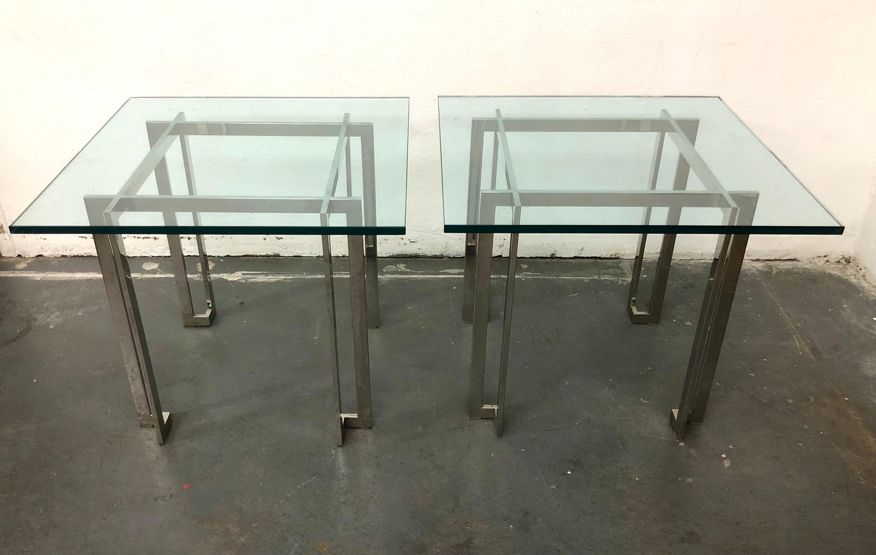 C. 1970s, chic architectural side tables in chromed steel with thick plate glass top. From the Estate of Herbert Kasper.
