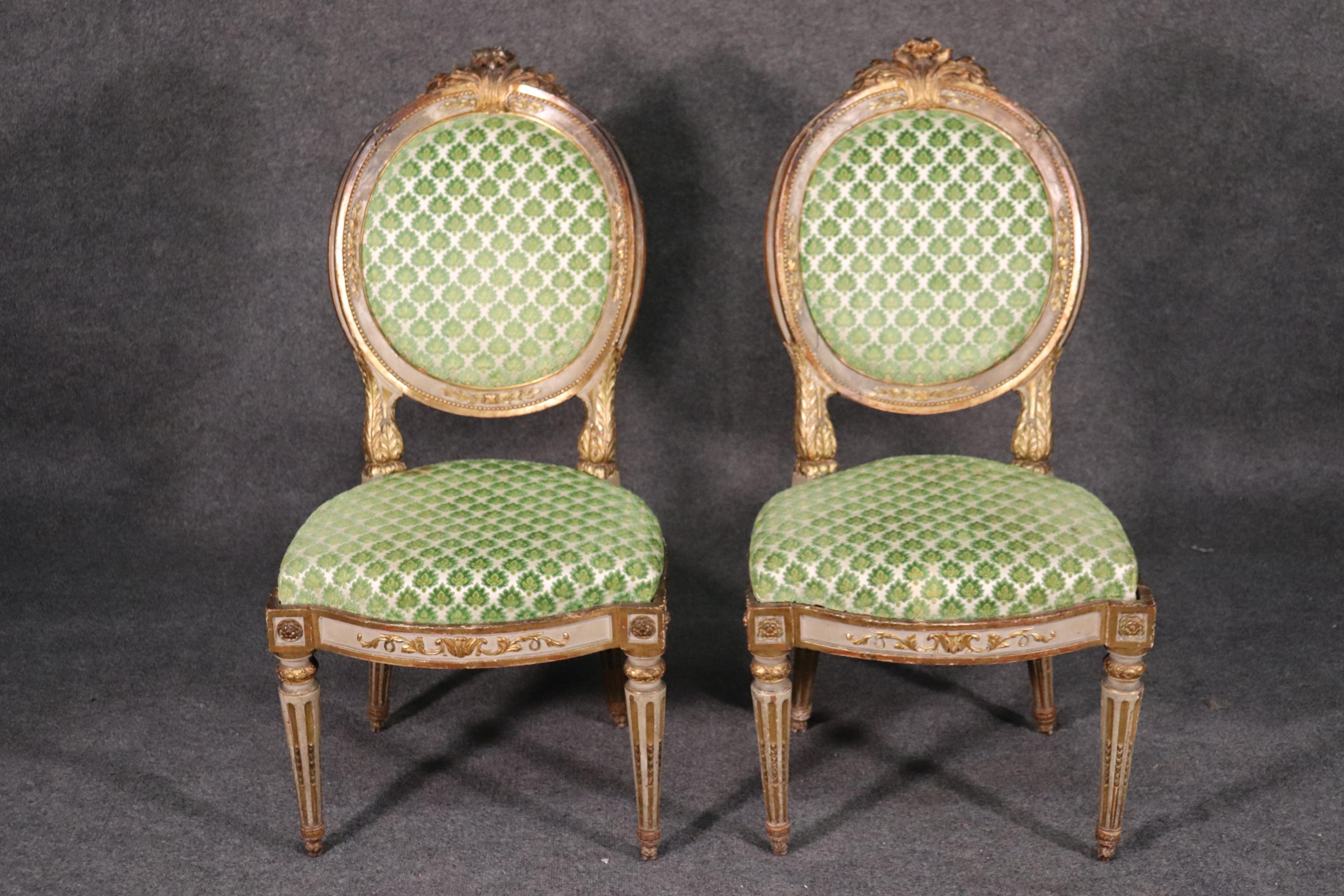 This is a nice pair of period 1780s French side chairs. The chairs measure: 39 tall x 20 wide x 23 deep and have a seat height of 18 inches.