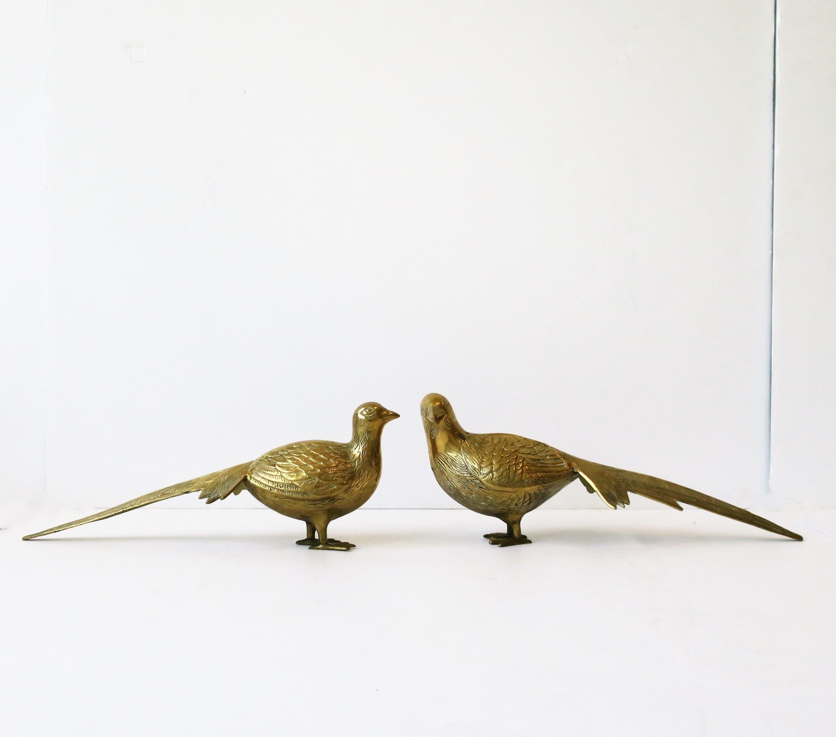 A pair of vintage brass pheasant birds sculptures or decorative objects, circa 1960s. 
Measurements: 6.5