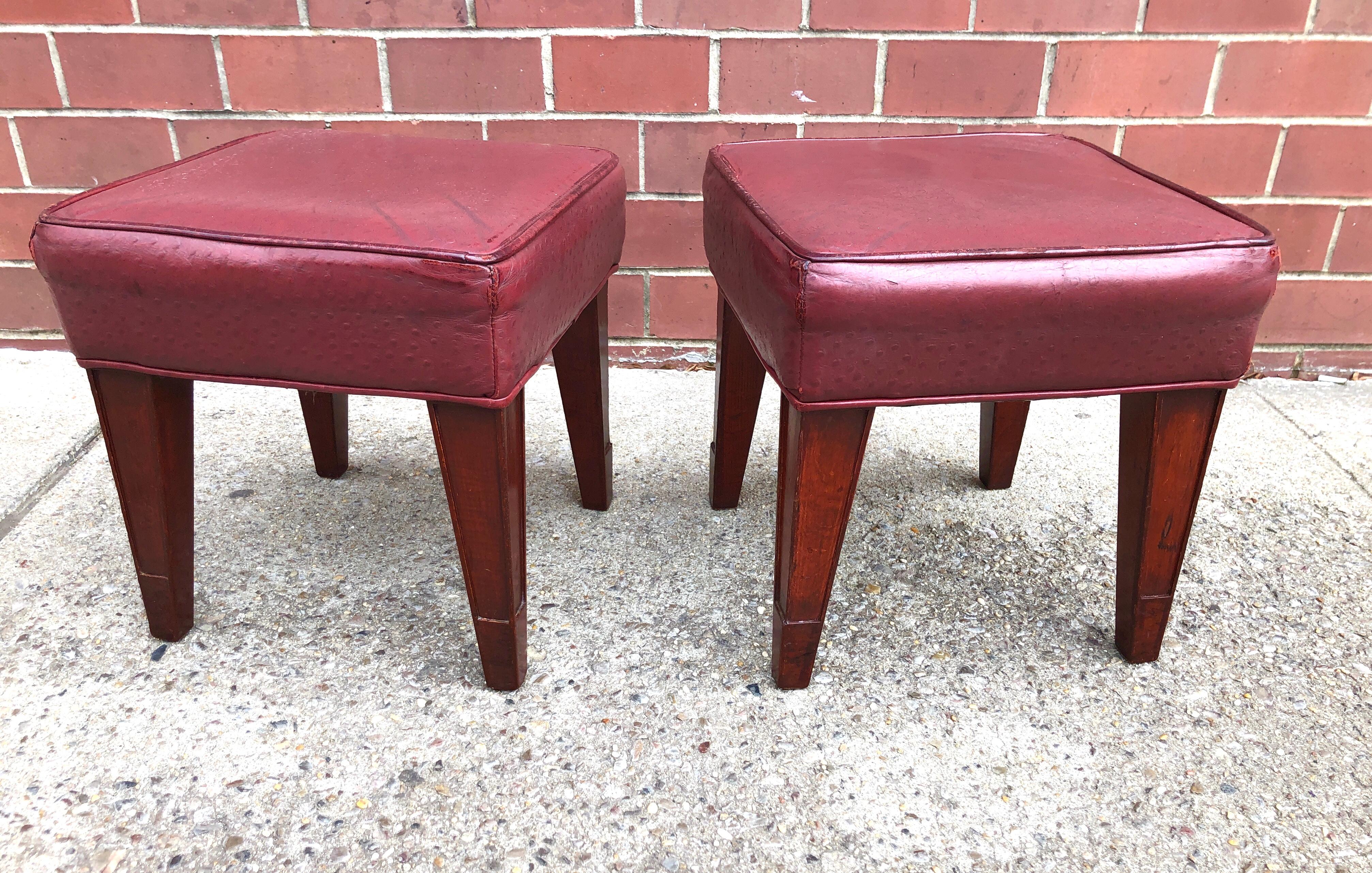 Mahogany stained wood, with burgundy Edelman ostrich leather seats, circa 1991. Two pairs available.