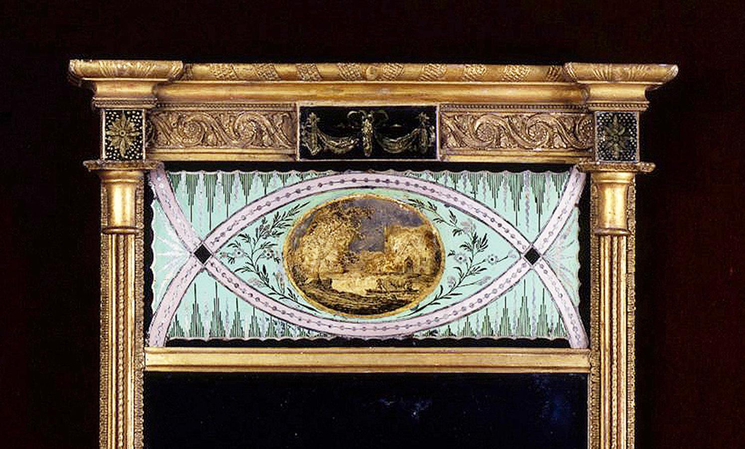 Pier mirror with Reverse Painted, or Eglomisé, Panels, about 1800
New York, New York
Eastern white pine, gessoed and gilded, with compo ornament, glass, reverse painted and gilded, and mirror
42 7/8 in. high, 22 1/2 in. wide, about 3 inches