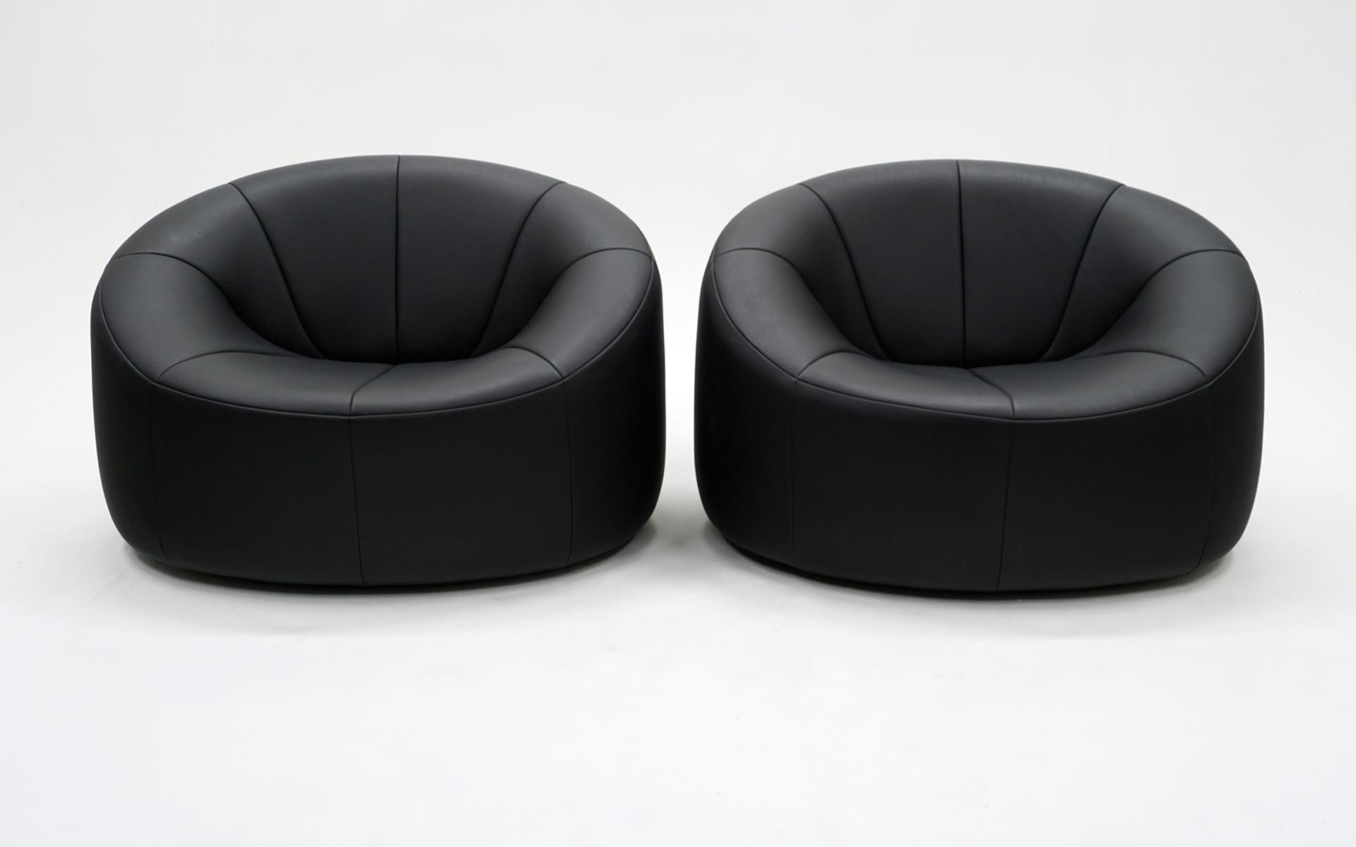 Great pair of round Pierre Paulin Pumpkin Chairs.  Signed and dated 2008, these have been used very little if any.  There are virtually no signs of wear.  Ready to place and use.  Very comfortable. 
