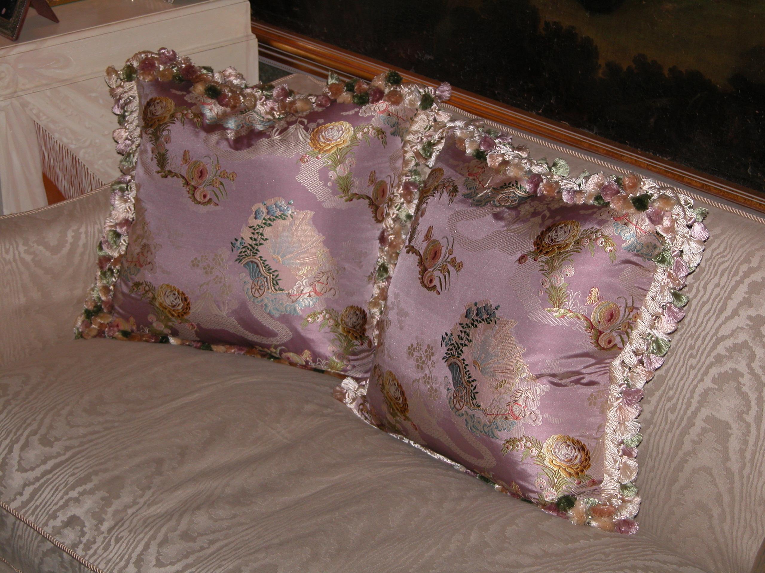Pair of silk brocade pillows with silk tassel trim by Scalamandre, the fabric is from Old World Weavers, Inc. Just made into pillows with down inserts and zippers.