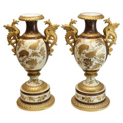 Pair of Pirkenhammer Porcelain Aesthetic Gold Encrusted Dragon Vases, circa 1880