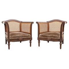 Pair Plantation Style Carved Wood Caned Club Chairs