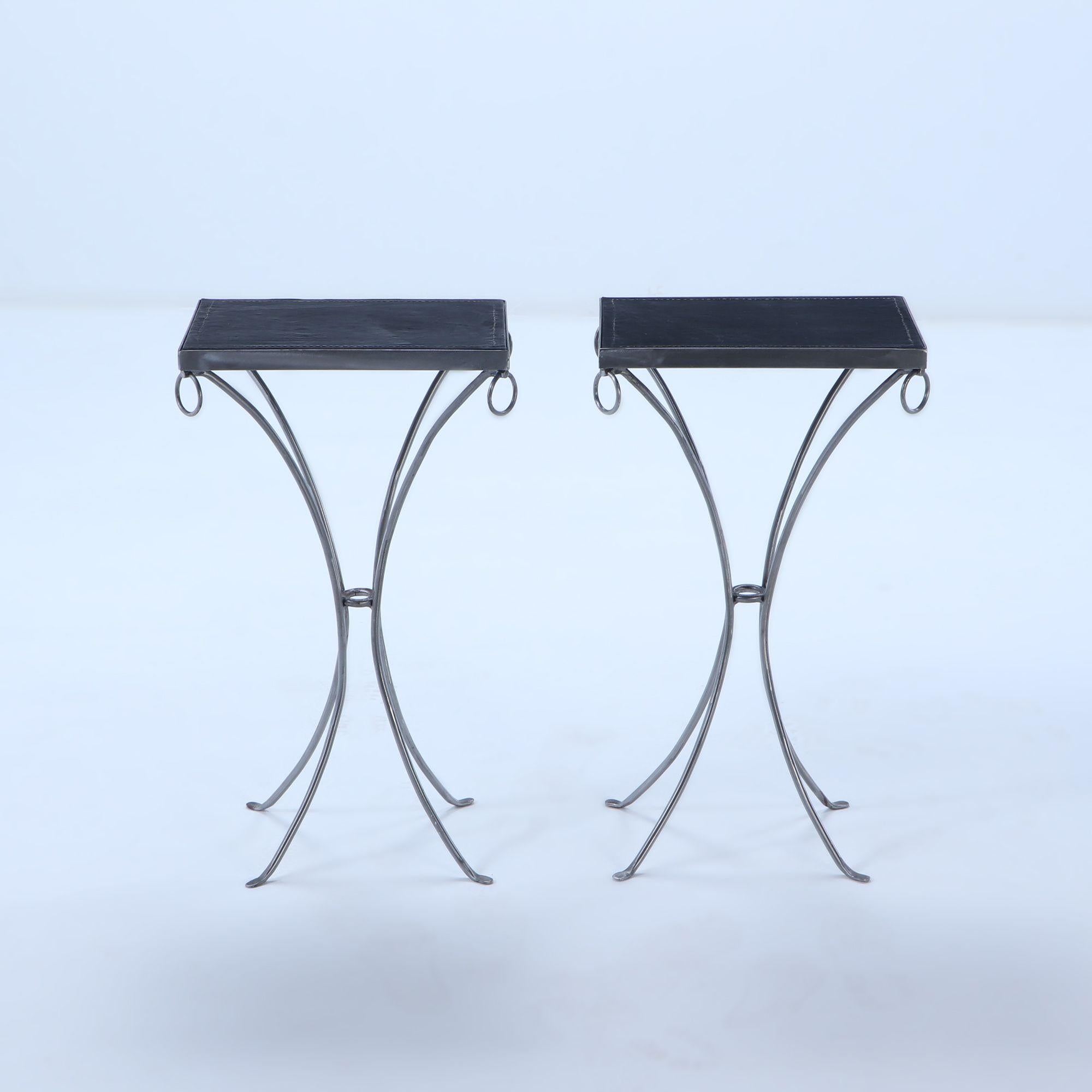 Mid-Century Modern Pair polished iron drinks tables with ring decoration and distressed leather For Sale