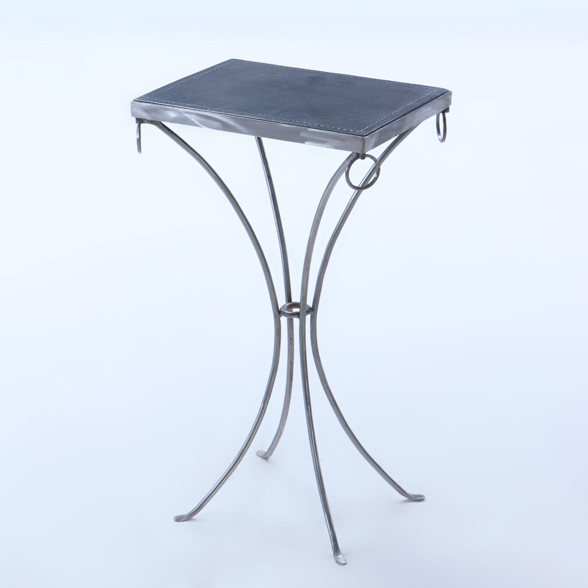 Pair polished iron drinks tables with ring decoration, distressed leather tops For Sale 1