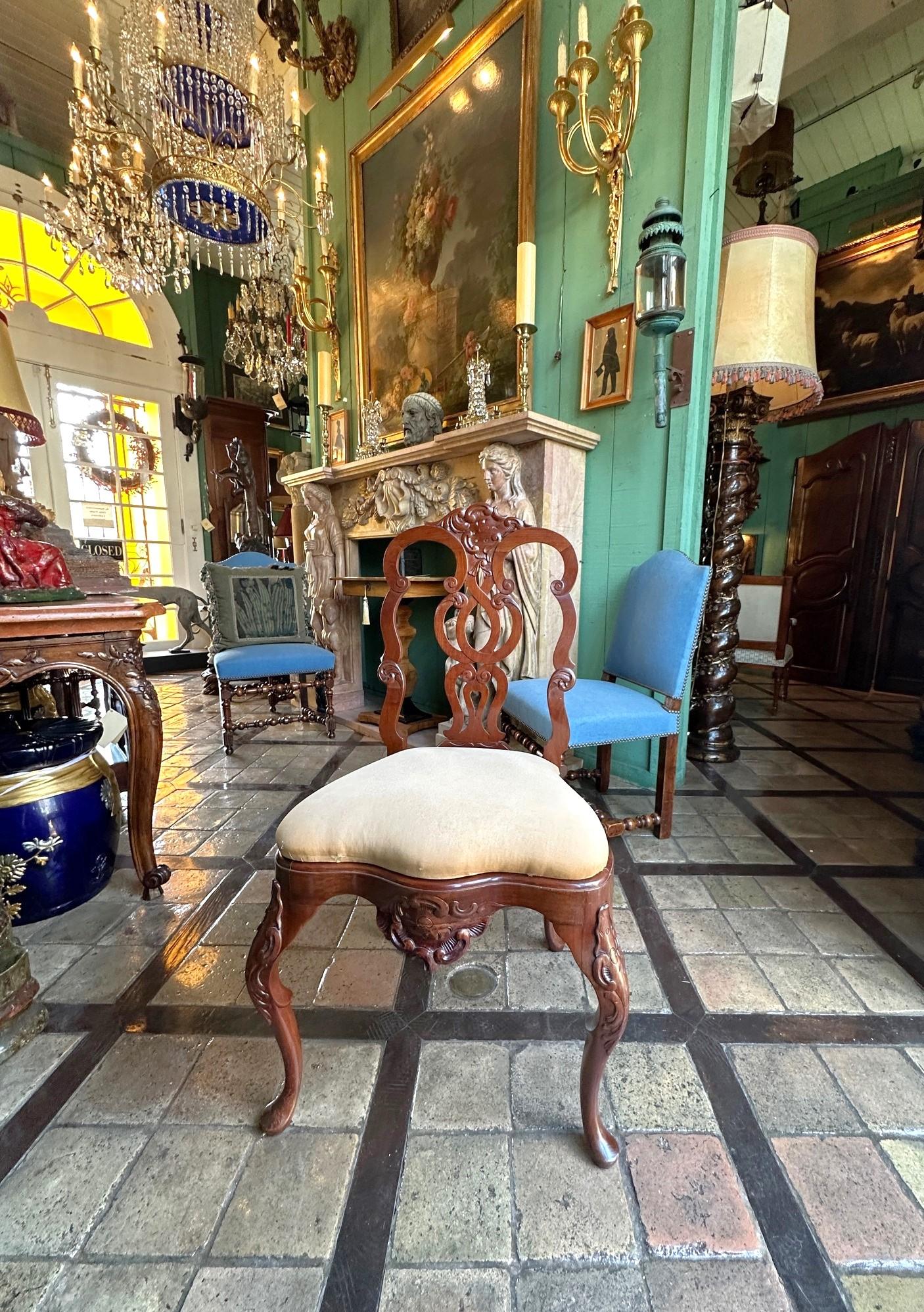 Pair Portuguese Rococo Jacaranda Hand carved Wood Dining Side Chairs Antique LA . An important Pair of 18th century Portuguese Rococo Jacaranda Wood High end dining room chairs with beautiful carving all around. This set of seating is upholstered in