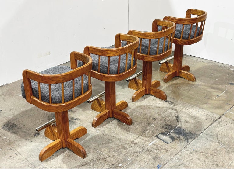 Pair Post Modern Bar Stools, Counter Height Swivel, Solid Oak After Lou Hodges For Sale at 1stDibs