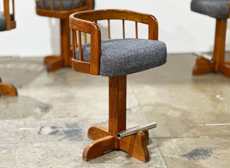 Pair Post Modern Bar Stools, Counter Height Swivel, Solid Oak After Lou Hodges For Sale at 1stDibs