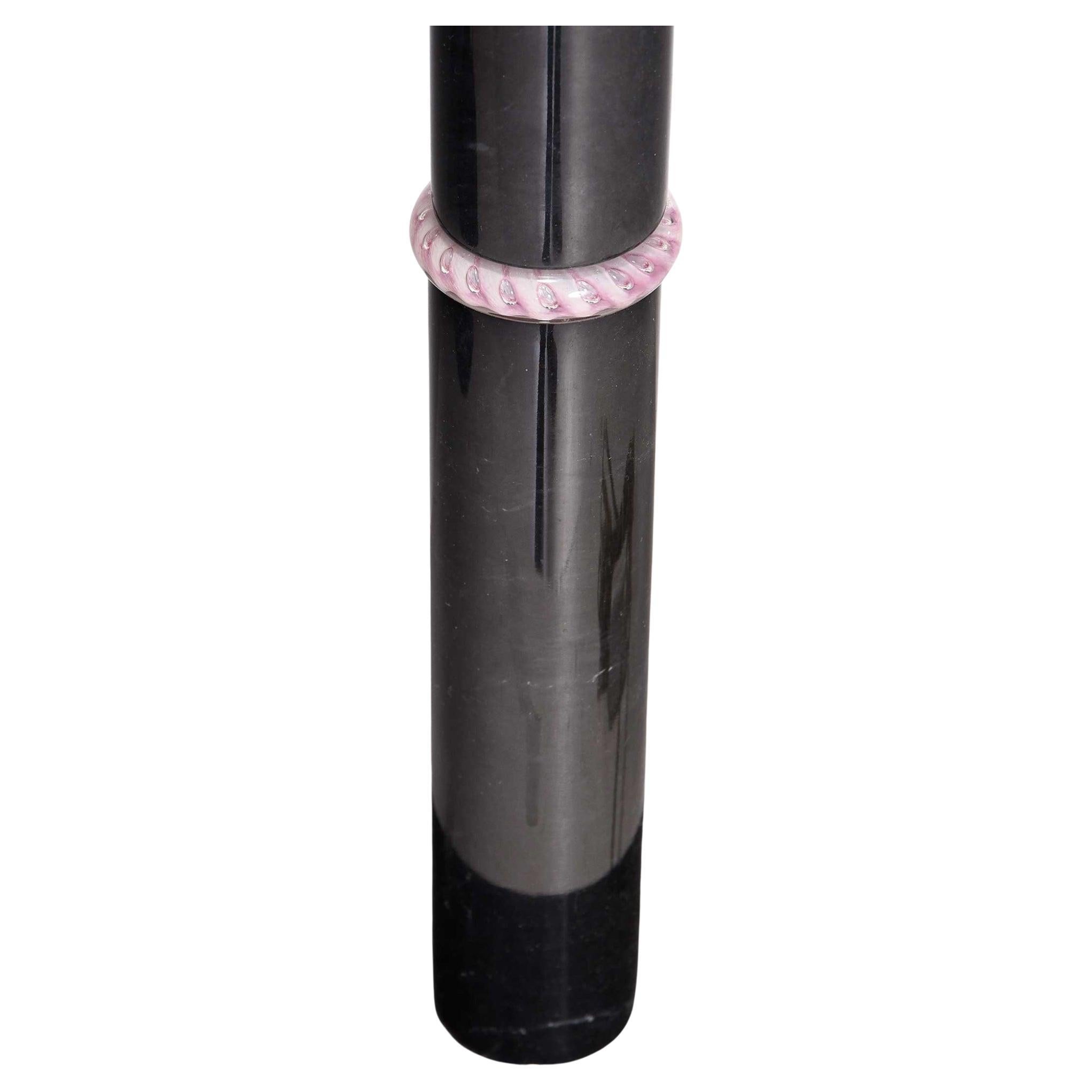 Pair Post Modern Design marble low Floor or table Lamps with Pink Art Glass pink Shade circa 1988. Each Laml has segmented black variegated stone base with clear to purple glass bands with conical amethyst glass shade with dark swirls. Signed and