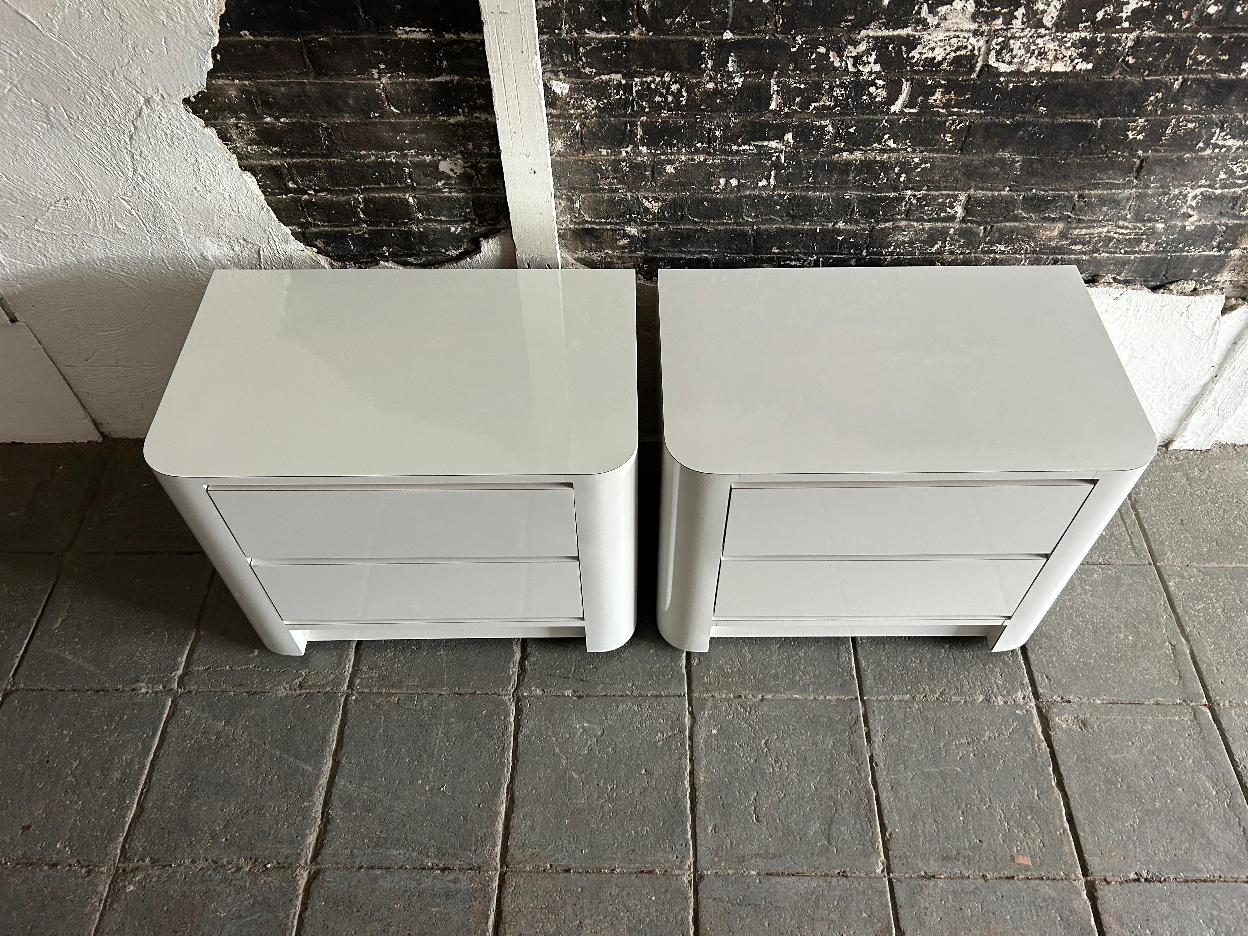 Pair of Mid Century custom made gloss white laminate and Nightstands 2 Drawers. Beautiful condition inside and out. Circa 1970 - 3 Drawer Nightstands all drawers have metal glides all smooth. Shows very little use. Post Modern. Located In Brooklyn