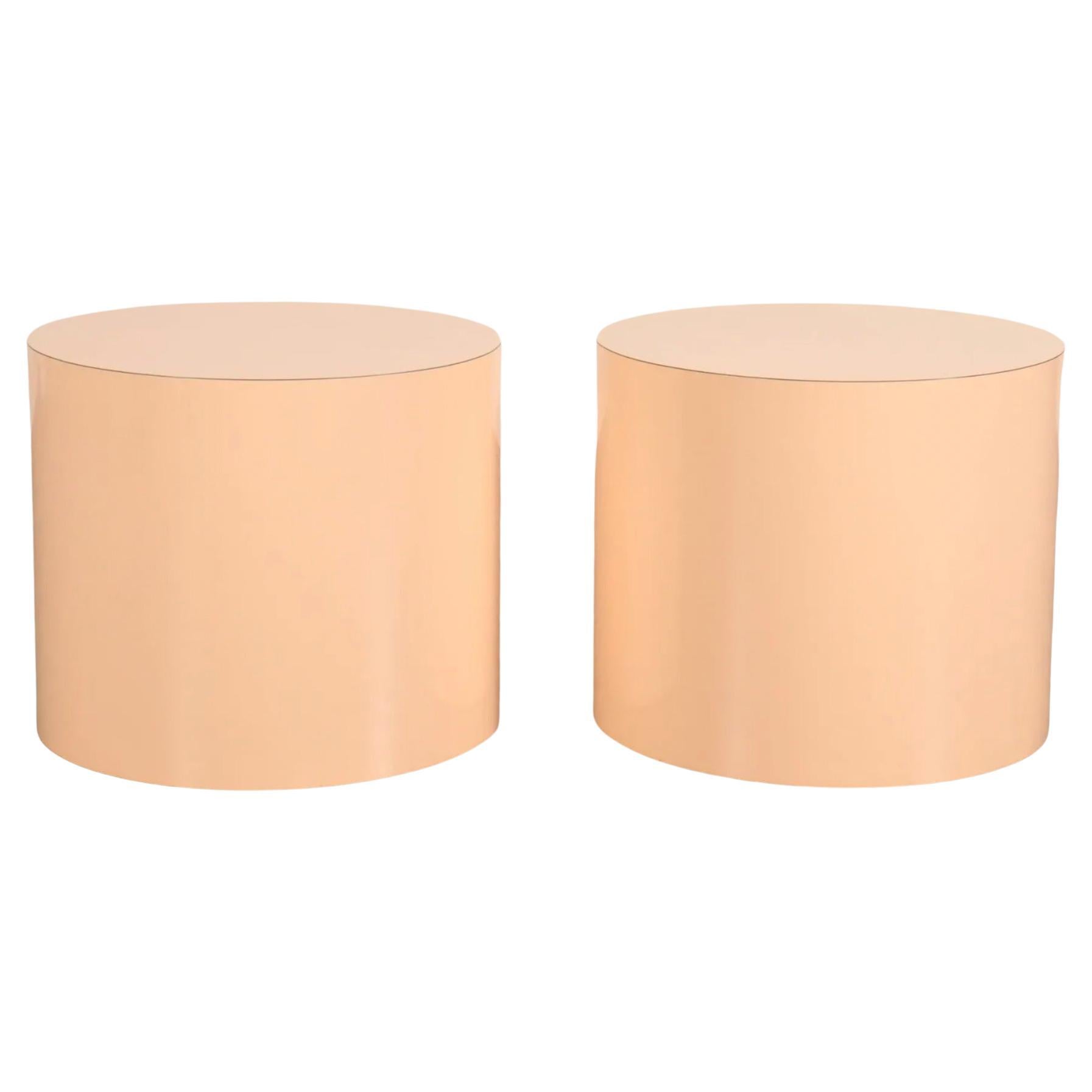 Pair Post modern pink gloss laminate round Cylinder end Drum tables. In the style of Karl Springer or Paul Mayen. Very clean set. No chips or scratches. Circa 1980. Located in Williamsburg Brooklyn NYC.

Sold as a pair (2) 

Each table measures 20”