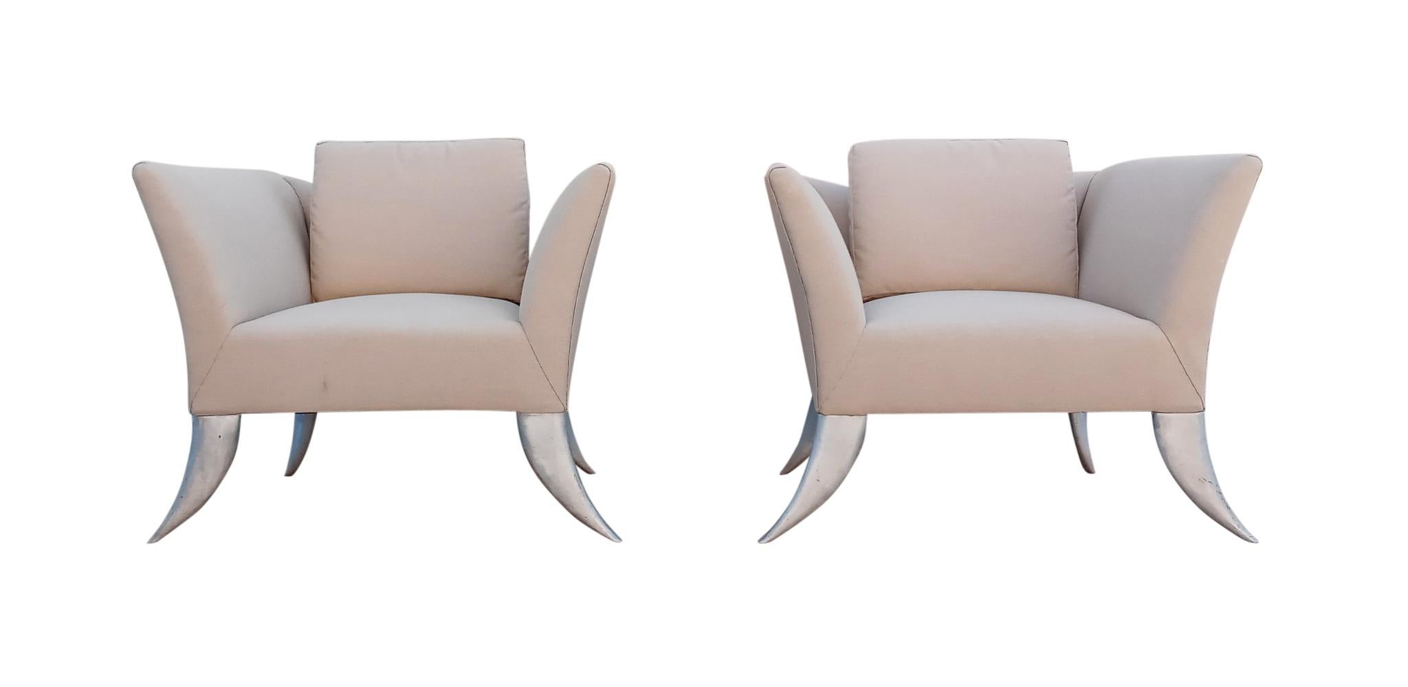 These super stylish Post-Modern lounge or club chairs are in the Style of Jordan Mozer. Like all Mozer custom design pieces, every aspect of these chair is designed with a curve or contour that anticipates human touch and comfort, both physically